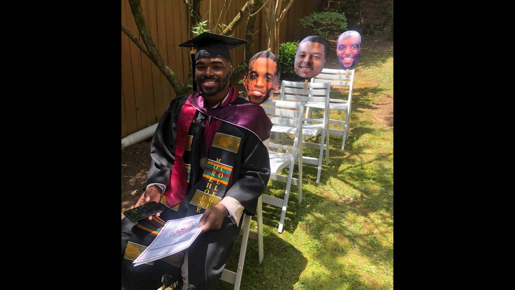 Family members created cutout photos of Terrell Jones Jr.’s closest friends from Morehouse College, who sat in chairs in the family backyard for a commencement celebration they did for him. The celebration included a surprise visit by his father, a U.S. Army chaplain stationed in Maryland.