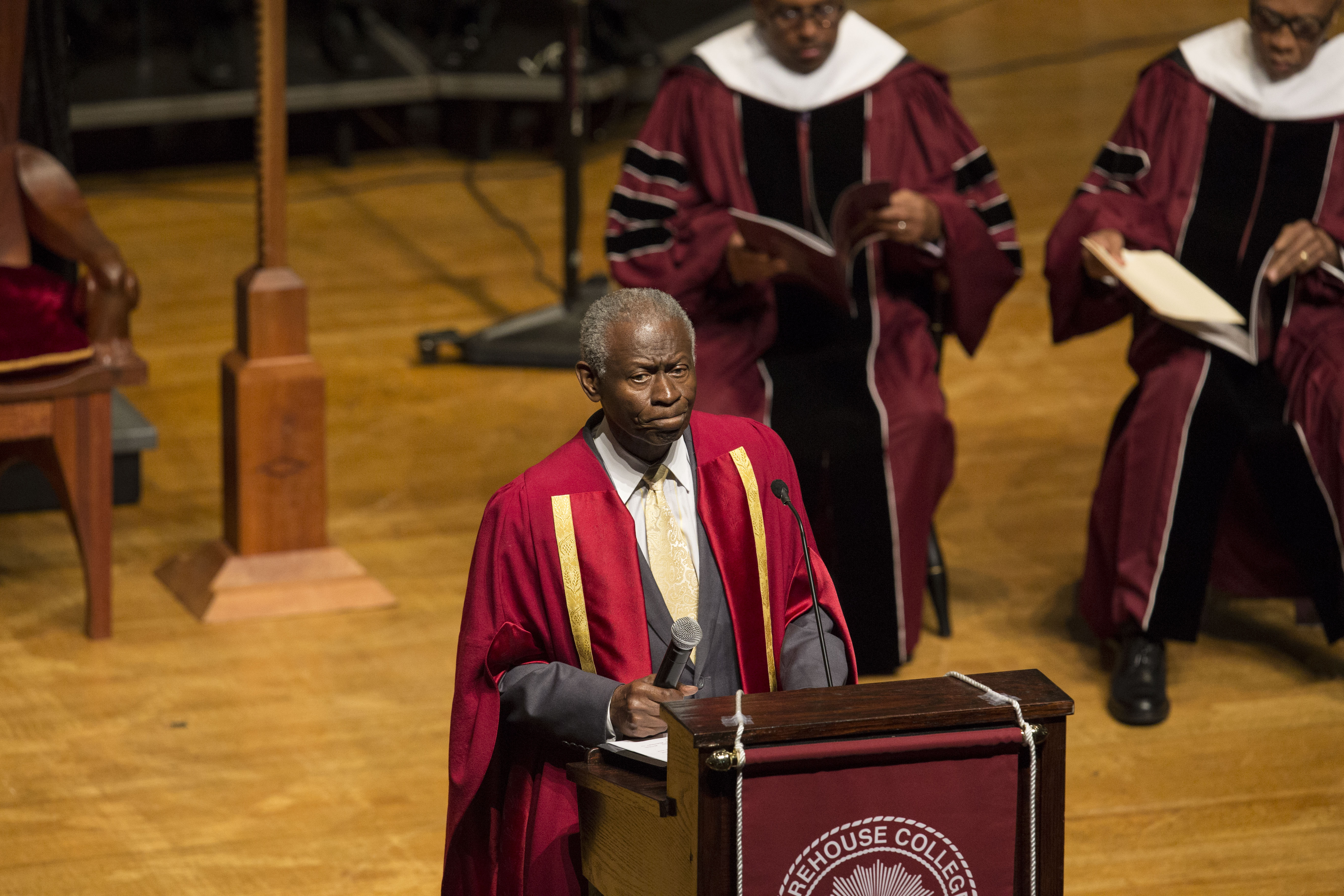 At the beginning of the service, Morehouse College's Dean of the Chapel, Reverend Dr. Lawrence Edward Carter Sr., starts the event with a prayer. Chad Rhym/ chad.rhym@ajc.com