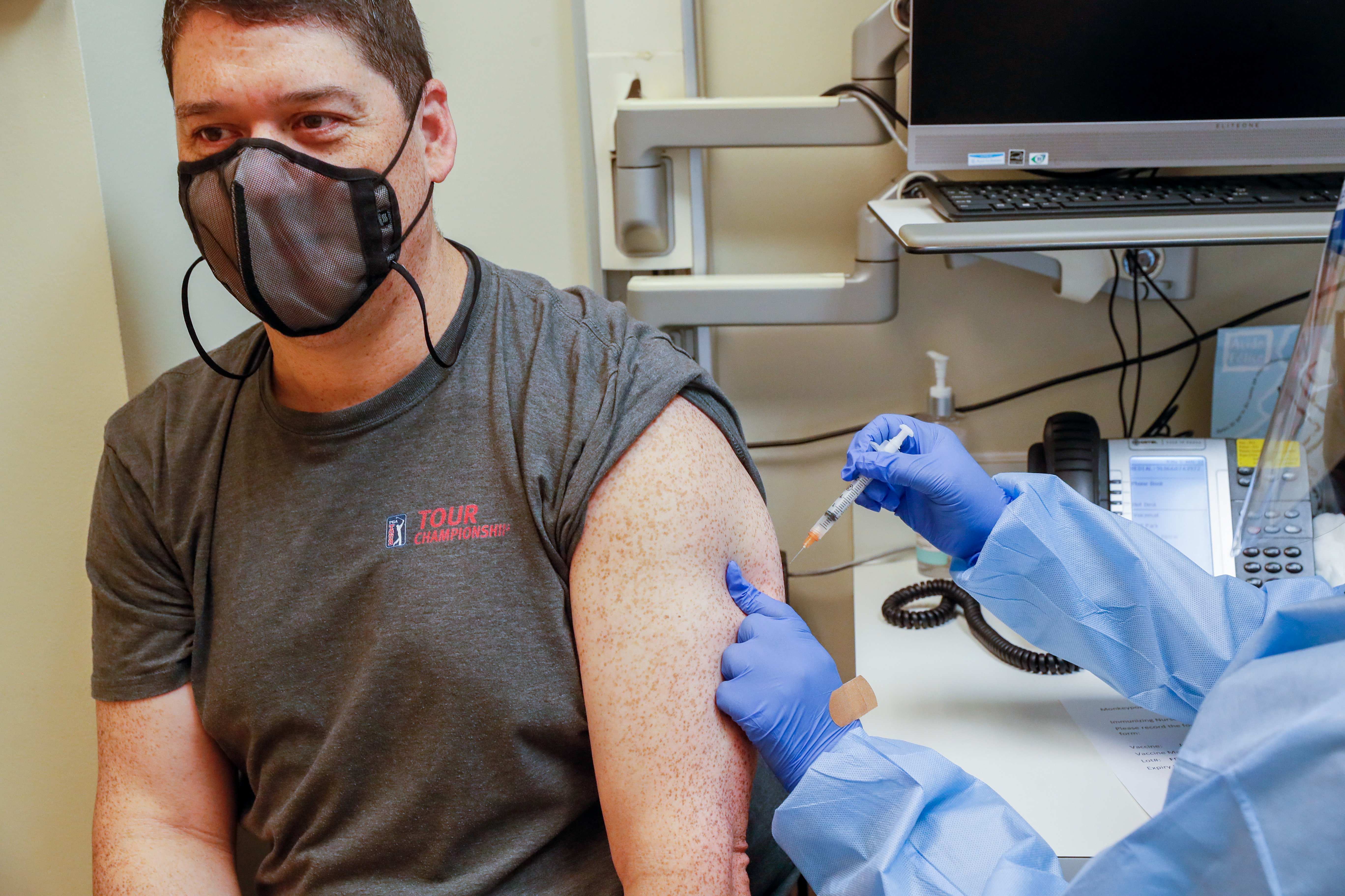 Robert Gilleo receives his monkeypox vaccination from Yolanda Johnson, BSN RN, at the North Dekalb Health Center in Chamblee on August 5, 2022. Steve Schaefer / steve.schaefer@ajc.com)