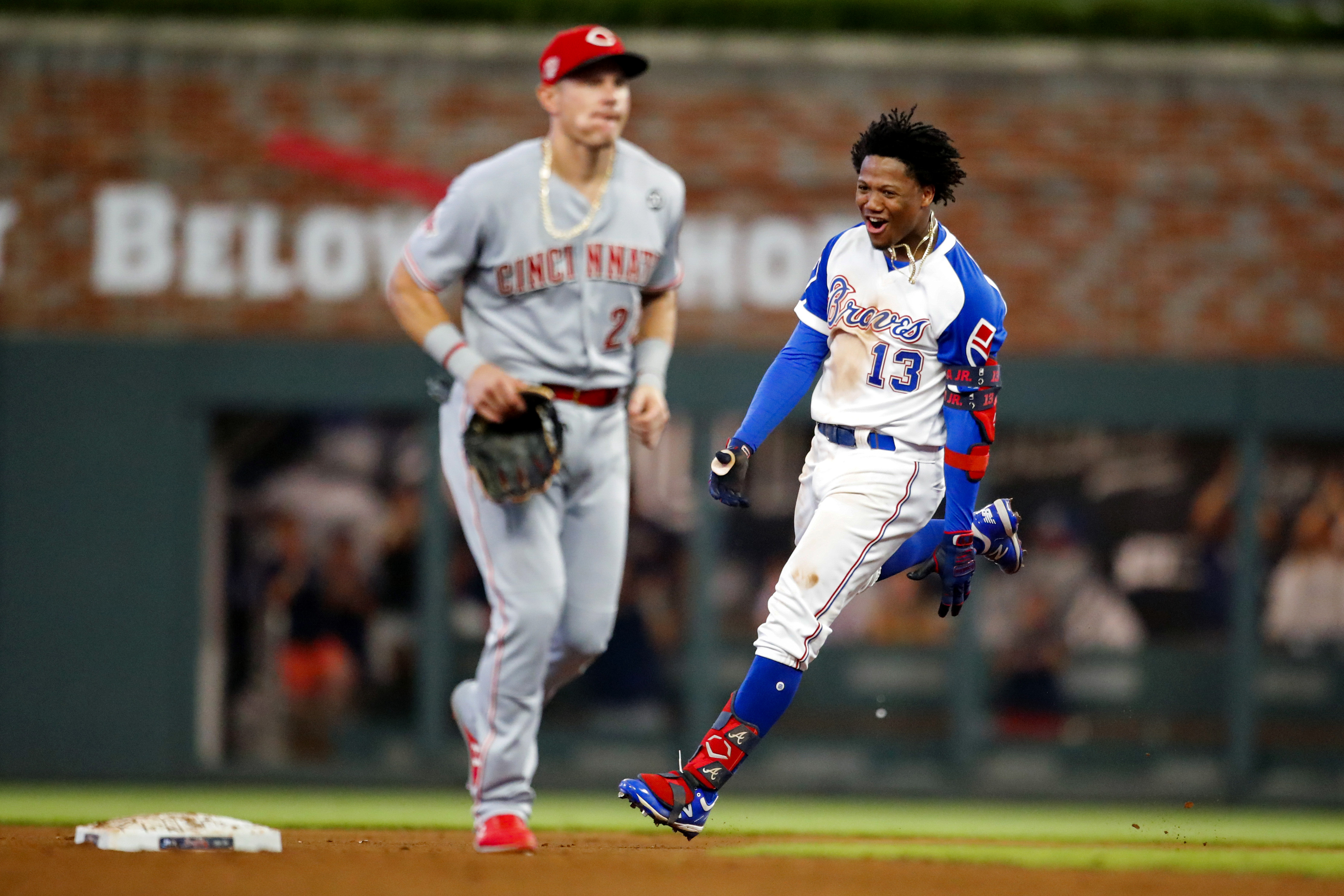 Ronald Acuna Jr. #13 of the Atlanta Braves is congratulated by