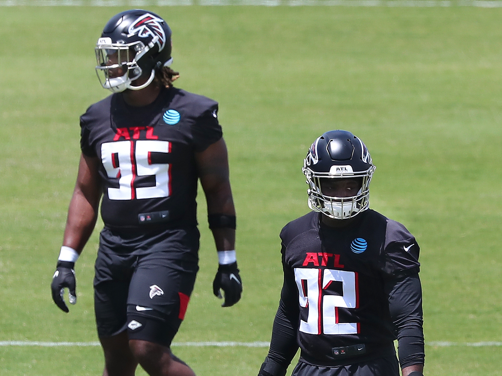 Atlanta Falcons outside linebacker Adetokunbo Ogundeji (92) works