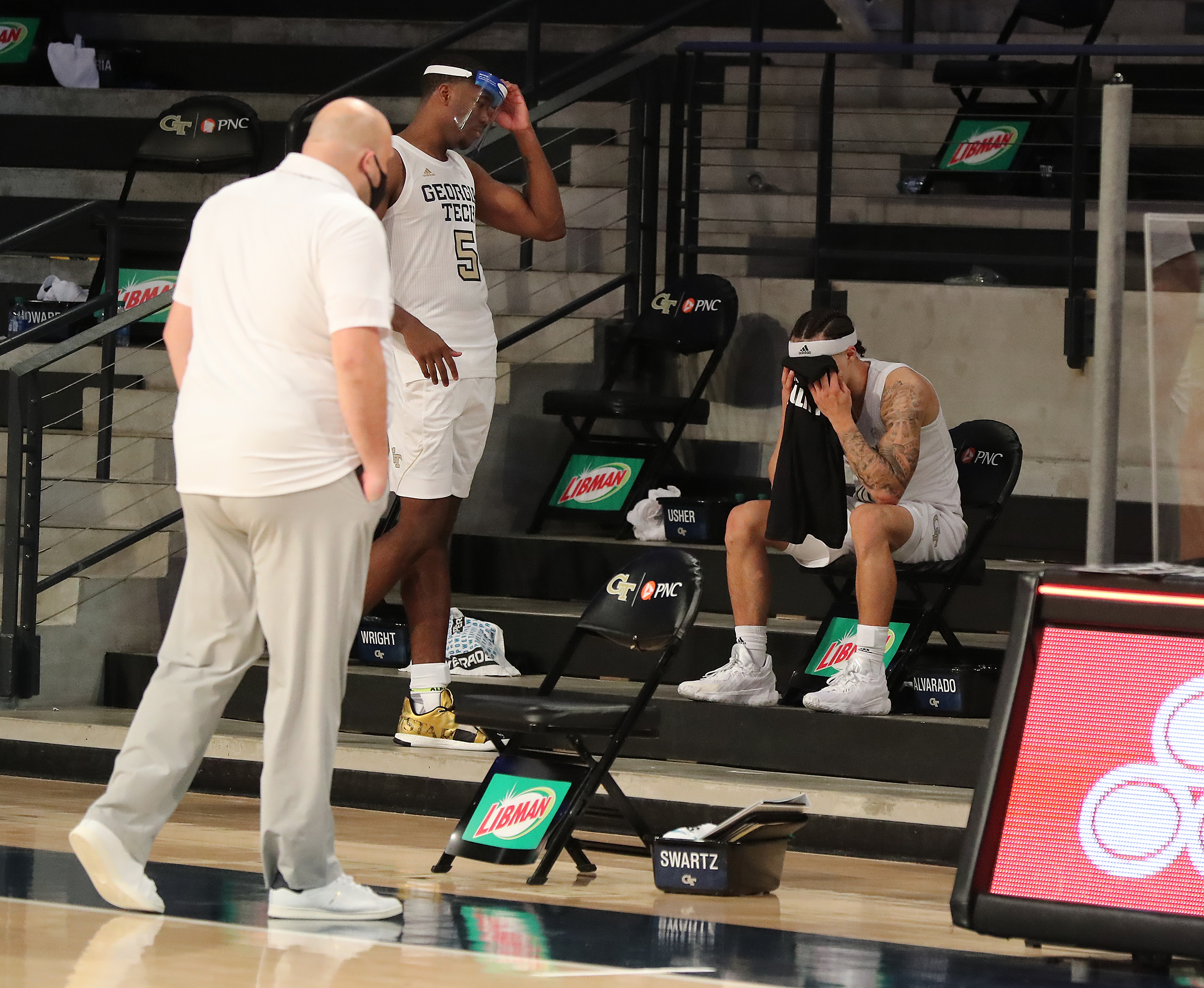 Georgia Tech guard Jose Alvarado (right) sits dejected on the bench after the game. “Curtis Compton / Curtis.Compton@ajc.com”