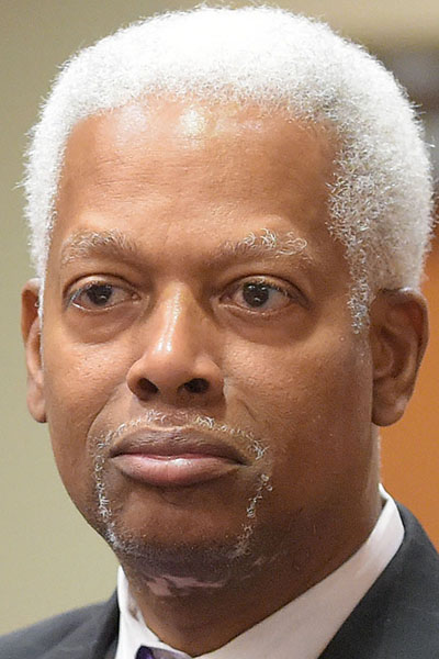 JULY 20, 2015 DECATUR Incoming DeKalb Commissioner Mereda Davis Johnson stands with her husband, US Rep. Hank Johnson, as she is sworn in by DeKalb Superior Court Judge Gregory A. Adams, Monday, July 20, 2015. Her election brings the county commission to a full seven members for the first time in more than two years.
KENT D. JOHNSON /KDJOHNSON@AJC.COM