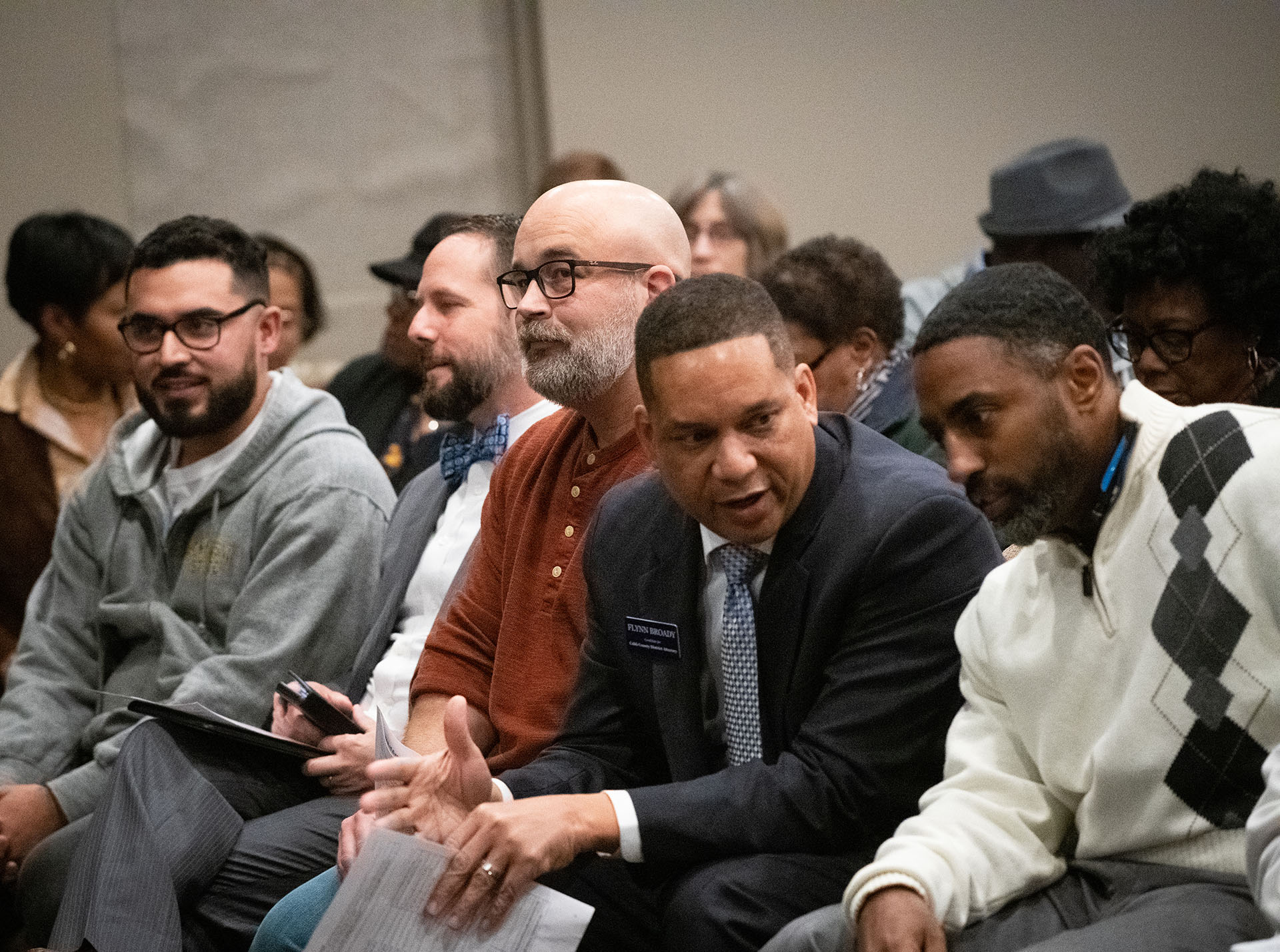 120619 MARIETTAâ Jimmy Herndon, center, who is running for Sheriff of Cobb County, listens during a town hall meeting hosted by the ACLU of Georgia, Cobb County Southern Christian Leadership Conference and La Gente de Cobb to discuss the conditions at the Cobb County Detention Center Monday, Dec. 9, 2019 at Life Church in Marietta, Ga. PHOTO BY ELISSA BENZIE