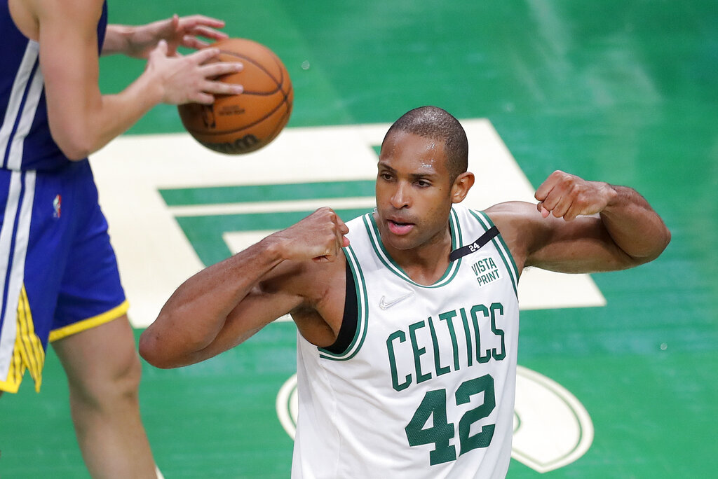Boston Celtics center Al Horford (42) reacts during the fourth quarter of Game 6 of basketball's NBA Finals against the Golden State Warriors, Thursday, June 16, 2022, in Boston. (AP Photo/Michael Dwyer)