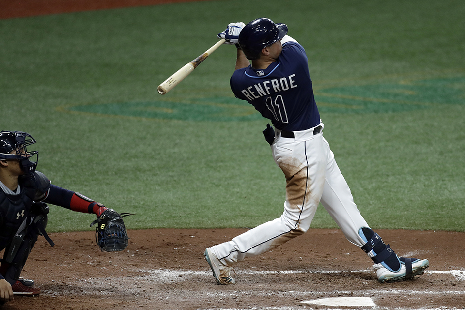 Tampa Bay's Hunter Renfroe connects for a three-run home run off Braves starting pitcher Mike Foltynewicz during the fourth inning Monday, July 27, 2020, in St. Petersburg, Fla. Folytnewicz was designated for assignment after the game.