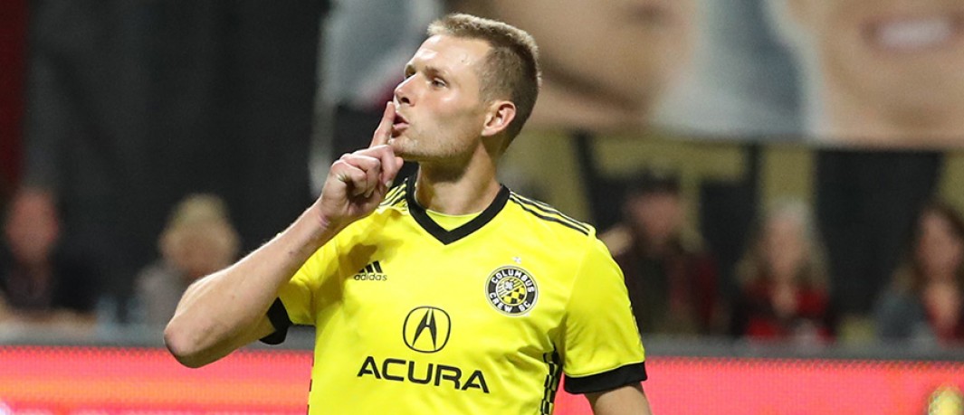 Columbus' Adam Jahn makes a "sssshhhh-ing" motion toward Atlanta United's supporters following the team's playoff victory in 2017. (Jason Getz / USA Today)