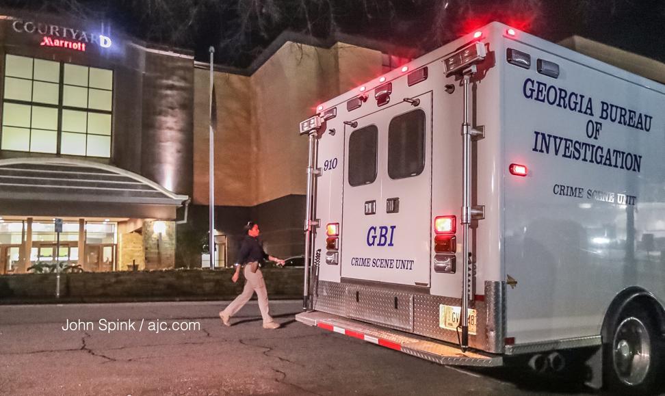 A hotel guest said he heard 8 to 10 loud pops but assumed they were part of continuing New Year’s Day celebrations. JOHN SPINK / JSPINK@AJC.COM