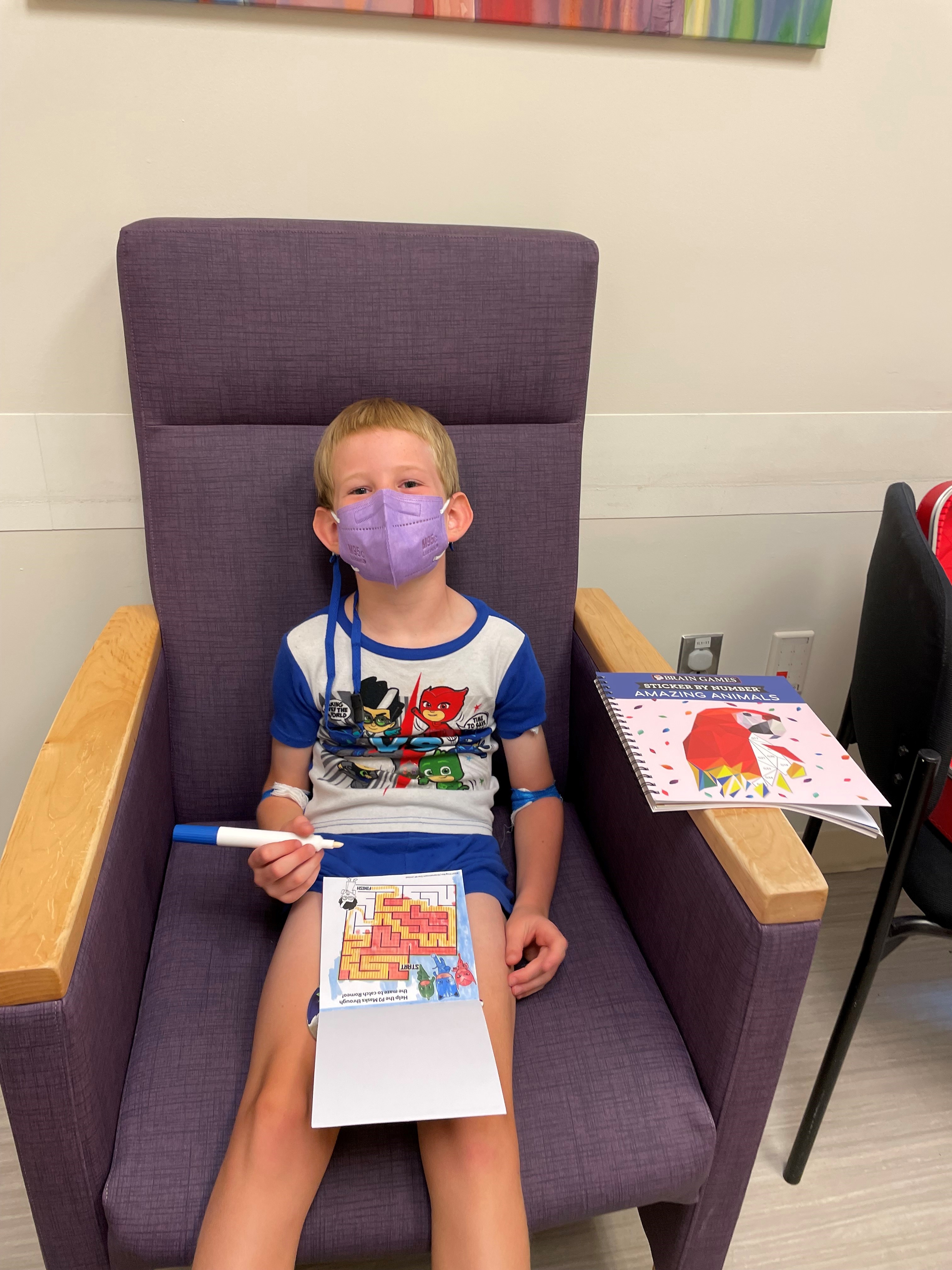 Willy Randall, 6, is shown here after getting his shot in the Moderna COVID-19 vaccine trial. His mother, Dr. Lori Randall, is an internal medicine doctor and doesn't know whether he got the vaccine or a placebo. But she has high hopes he got the vaccine. (Photo courtesy of Lori Randall)