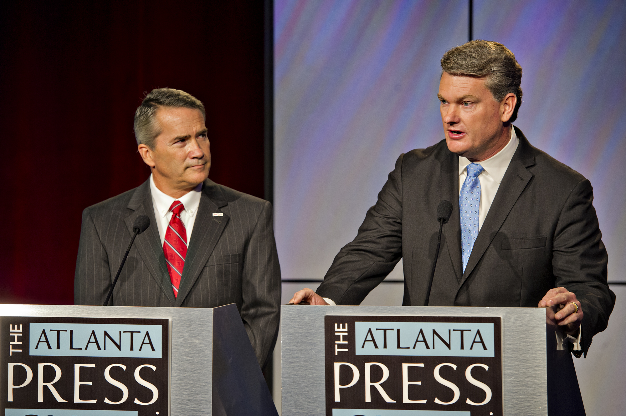 Mike Collins, right, is shown debating Jody Hice in 2014, when they were both running in the 10th Congressional District. Hice, who won that race, is leaving the U.S. House to run for secretary of state. Collins is once again running for the House seat, and polls show him in a commanding lead in a crowded field that Vernon Jones just joined with an endorsement from former President Donald Trump.