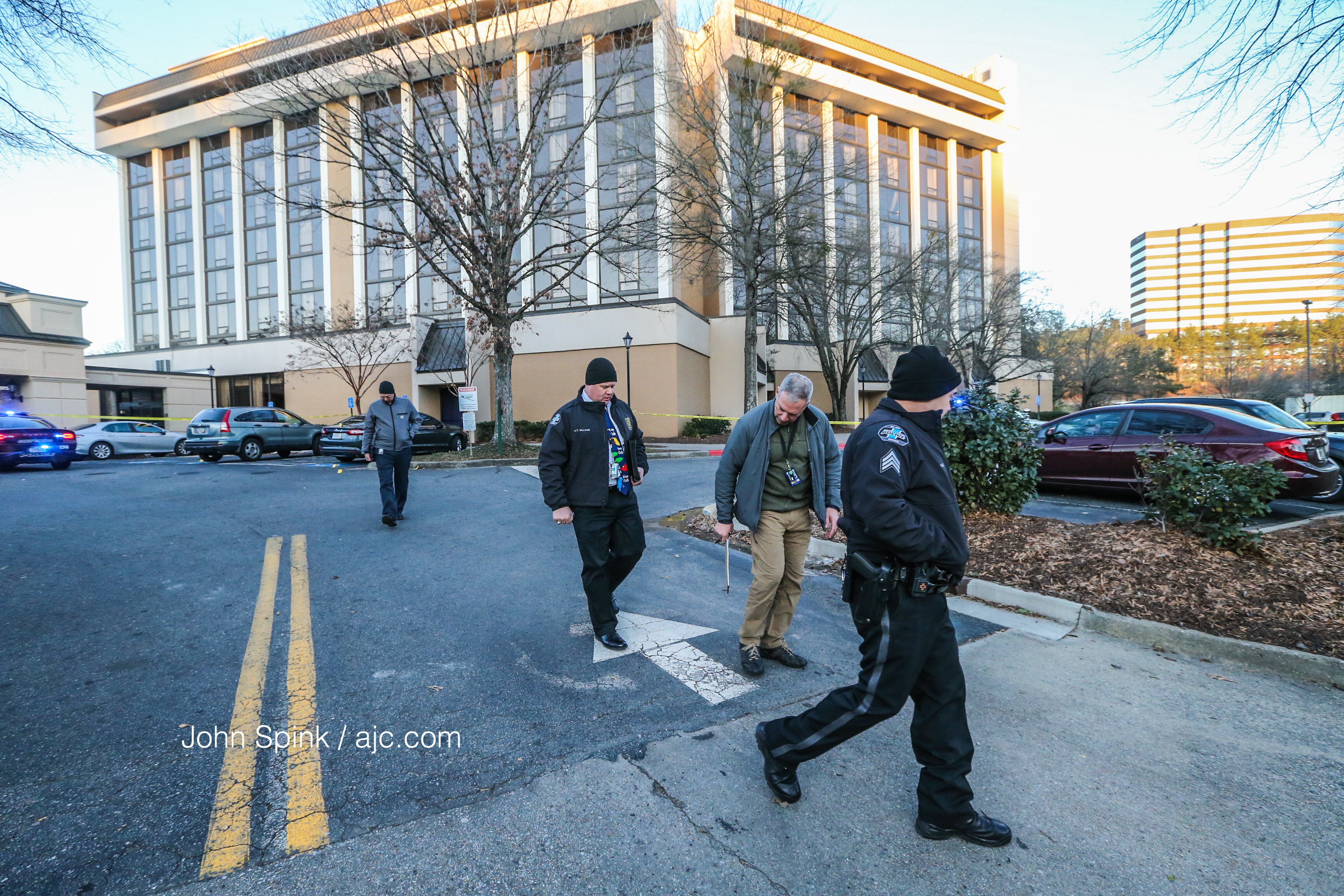 Authorities investigated a shooting Friday involving an FBI agent. JOHN SPINK / JSPINK@AJC.COM