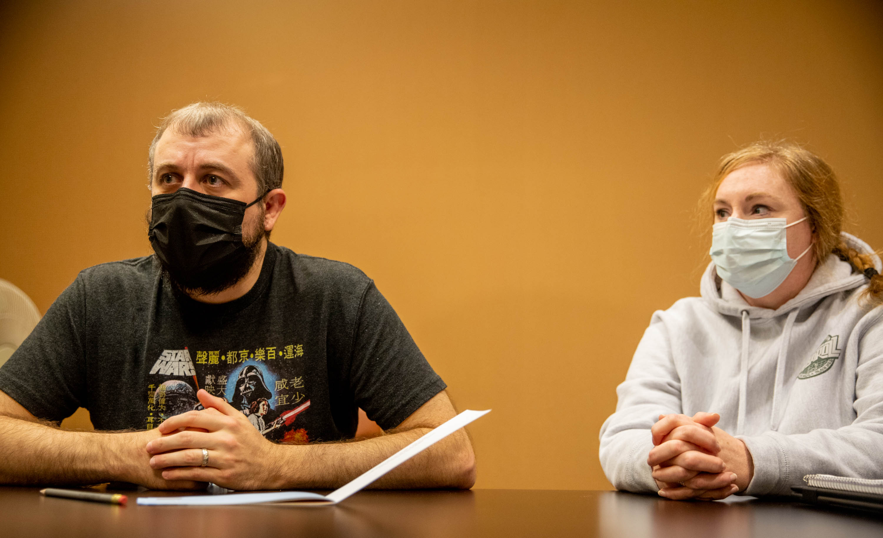 Koie Smith, left, and his wife Jennifer Smith, right, speak to a reporter at AbsoluteCare on Peachtree Street on Thursday, Oct 21, 2021. Koie contracted COVID-19 in March and has ongoing problems with neurological processing, sleeping, smelling and taste. He recently decided to take medical leave from his executive leadership IT position to focus on his therapy in the hope that he can regain function. (Jenni Girtman for The Atlanta Journal-Constitution