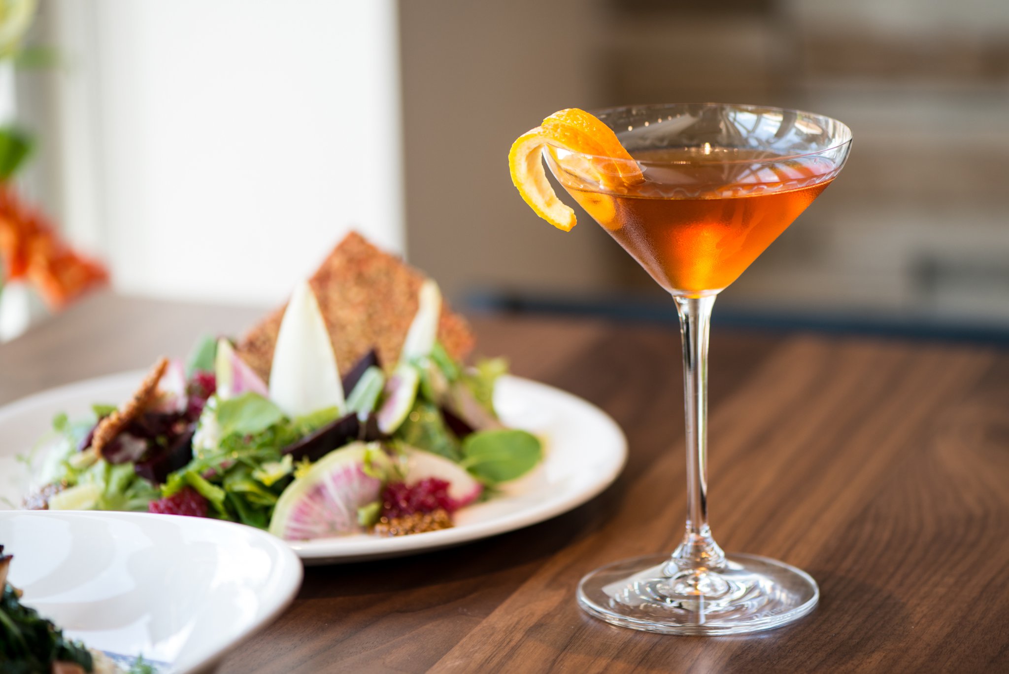 Red Rum Cocktail with rye whisky, dark rum, Grand Marnier, and bitters. Photo credit- Mia Yakel