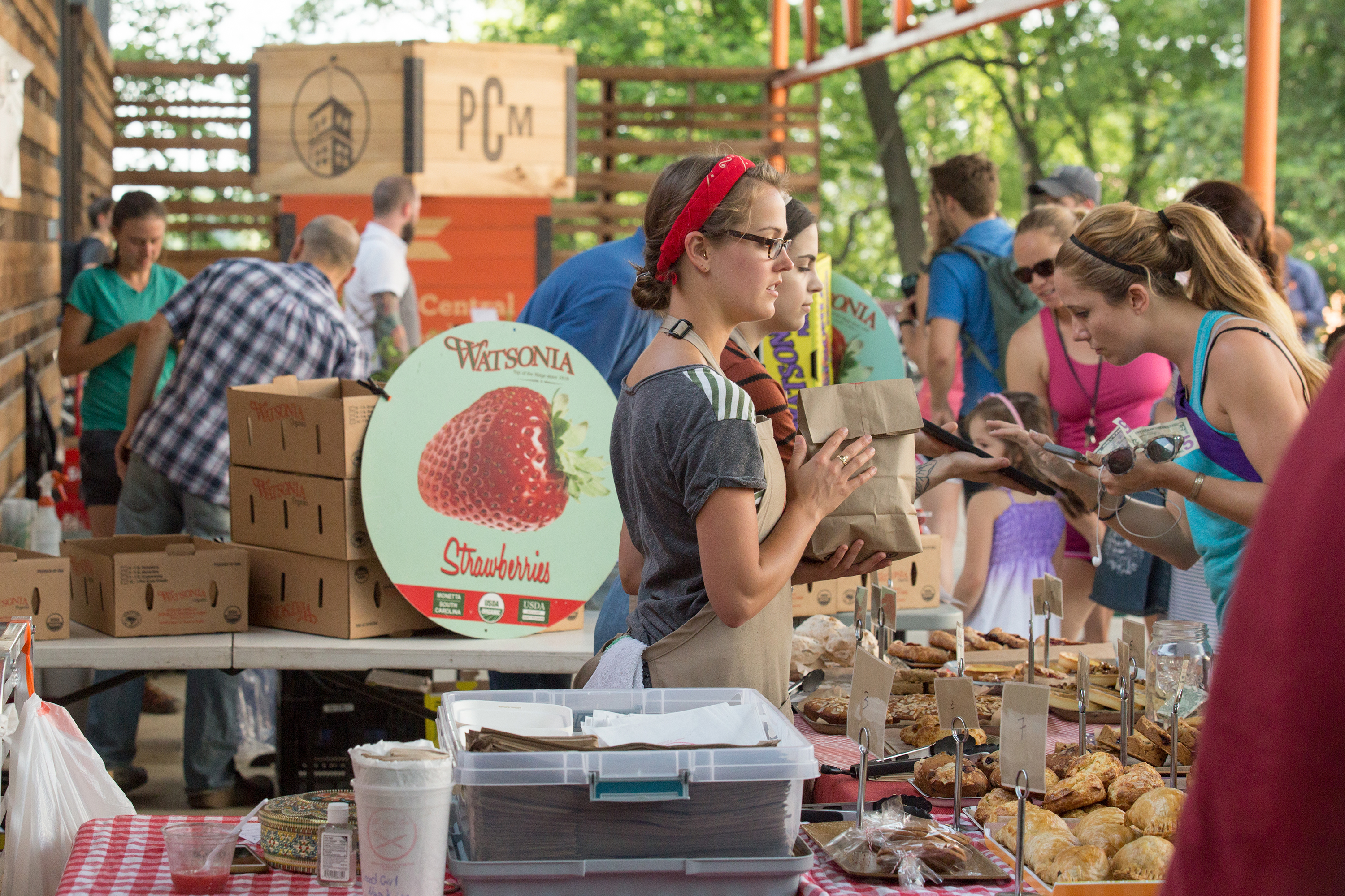 Danielle Morrison is working The Little Tart booth at The Ponce City Farmers Market. (Jenni Girtman / Atlanta Event Photography)