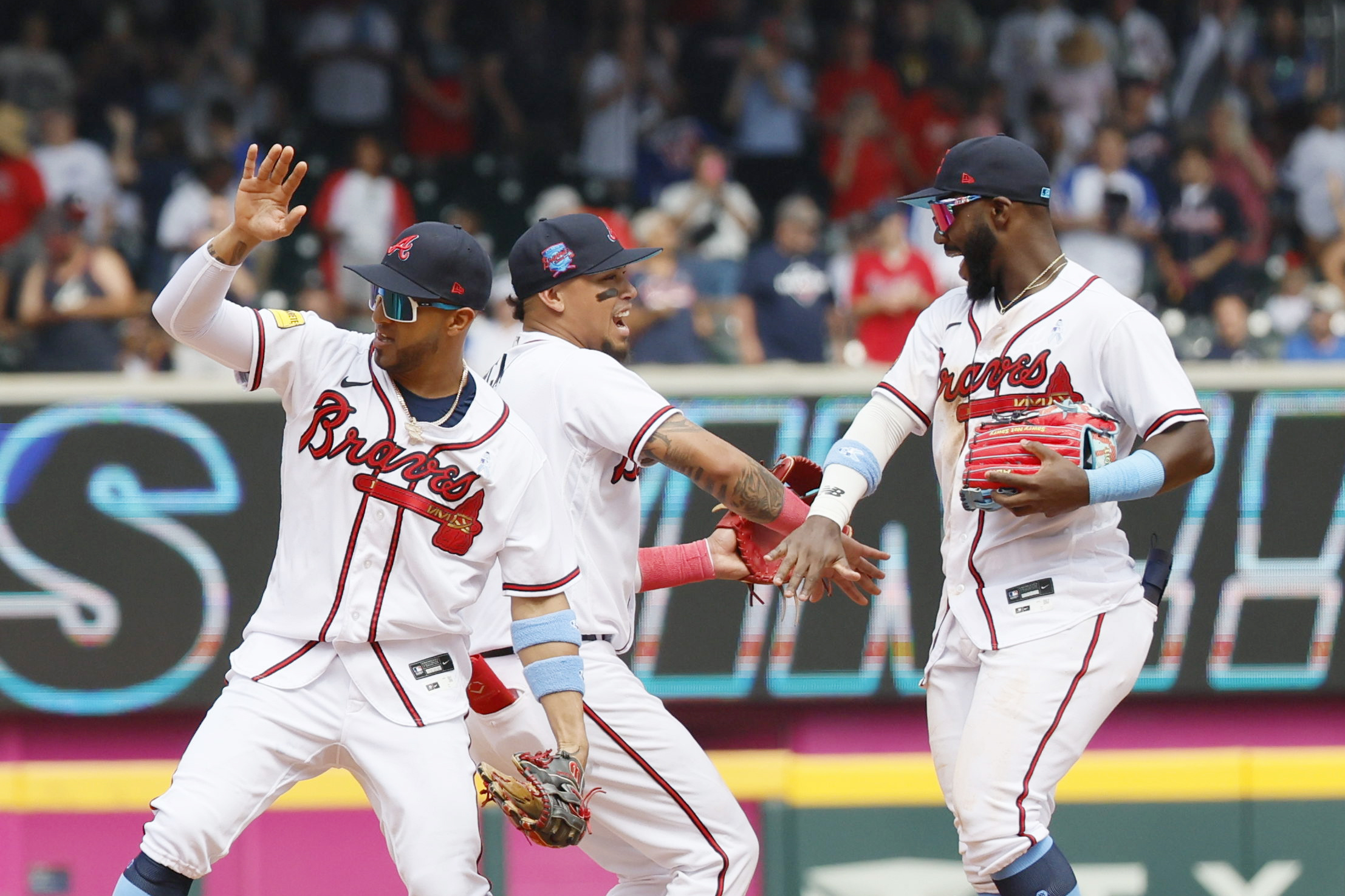 Braves score 4 in 11th, top Rockies 6-2, spoil uniform debut