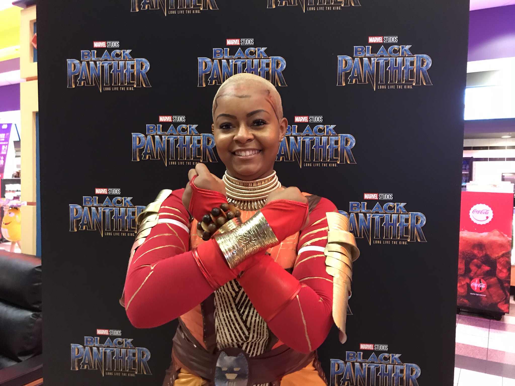 Atlanta's Alexandra Gainous, an actor and model, dressed up as General Okoye in "Black Panther" played by Danai Gurira, to a screening of the film Tuesday night at Regal Cinemas in Atlantic Station. CREDIT: Rodney Ho/rho@ajc.com