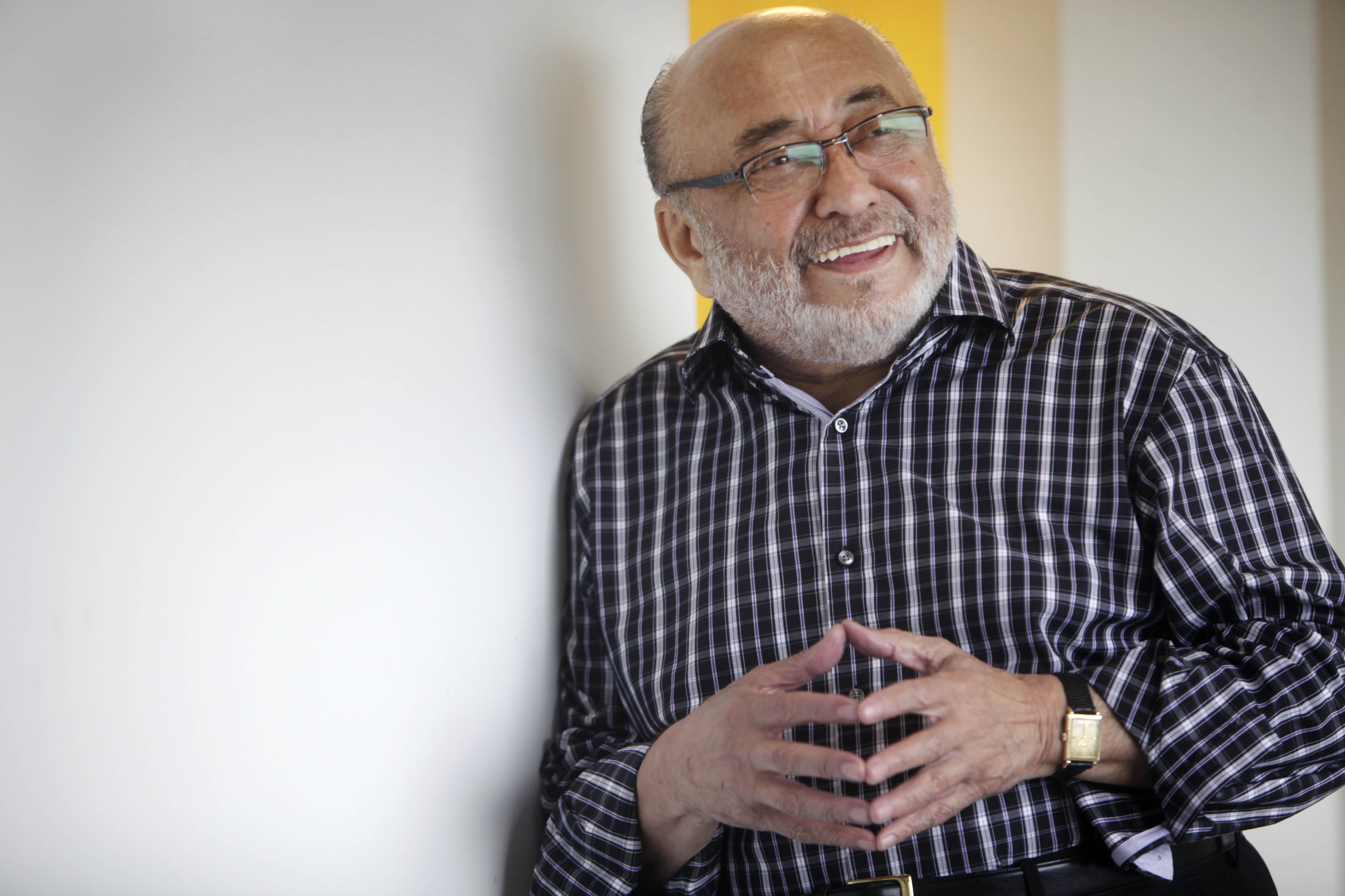 Pianist Eddie Palmieri poses for a picture in New York, Monday, Aug. 15, 2011. (AP Photo/Seth Wenig)