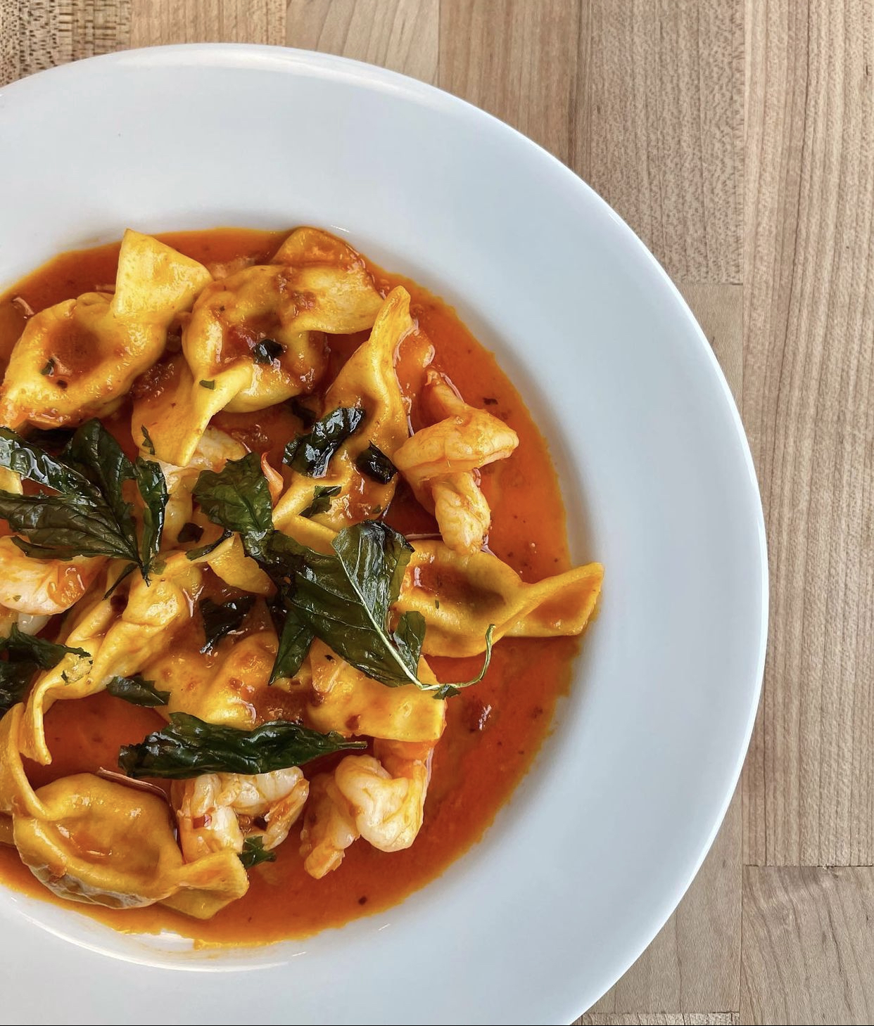 Casoncelli with shrimp and a sauce spiked with ’nduja is part of a rotating menu of eight house-made pastas at Bastone. Courtesy of Kathryn McCrary Photography