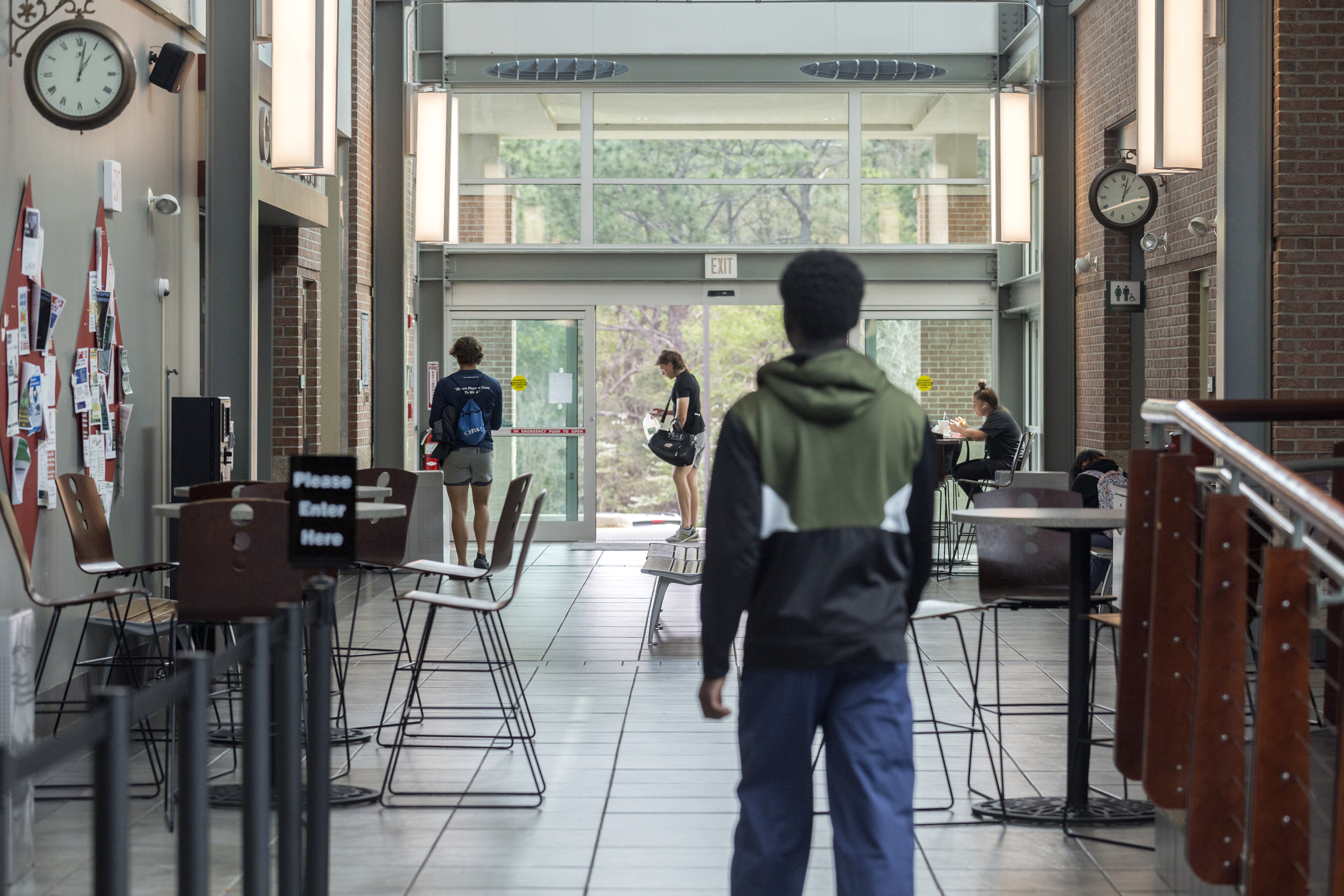 East Georgia State College students walk through the campus student center during lunch in Swainsboro, Georgia, on March 28, 2022. Since enrollment is down and many students are opting to take classes virtually, the lines for lunch are not very long and the student center is nearly empty. (Stephen B. Morton for The Atlanta Journal-Constitution)