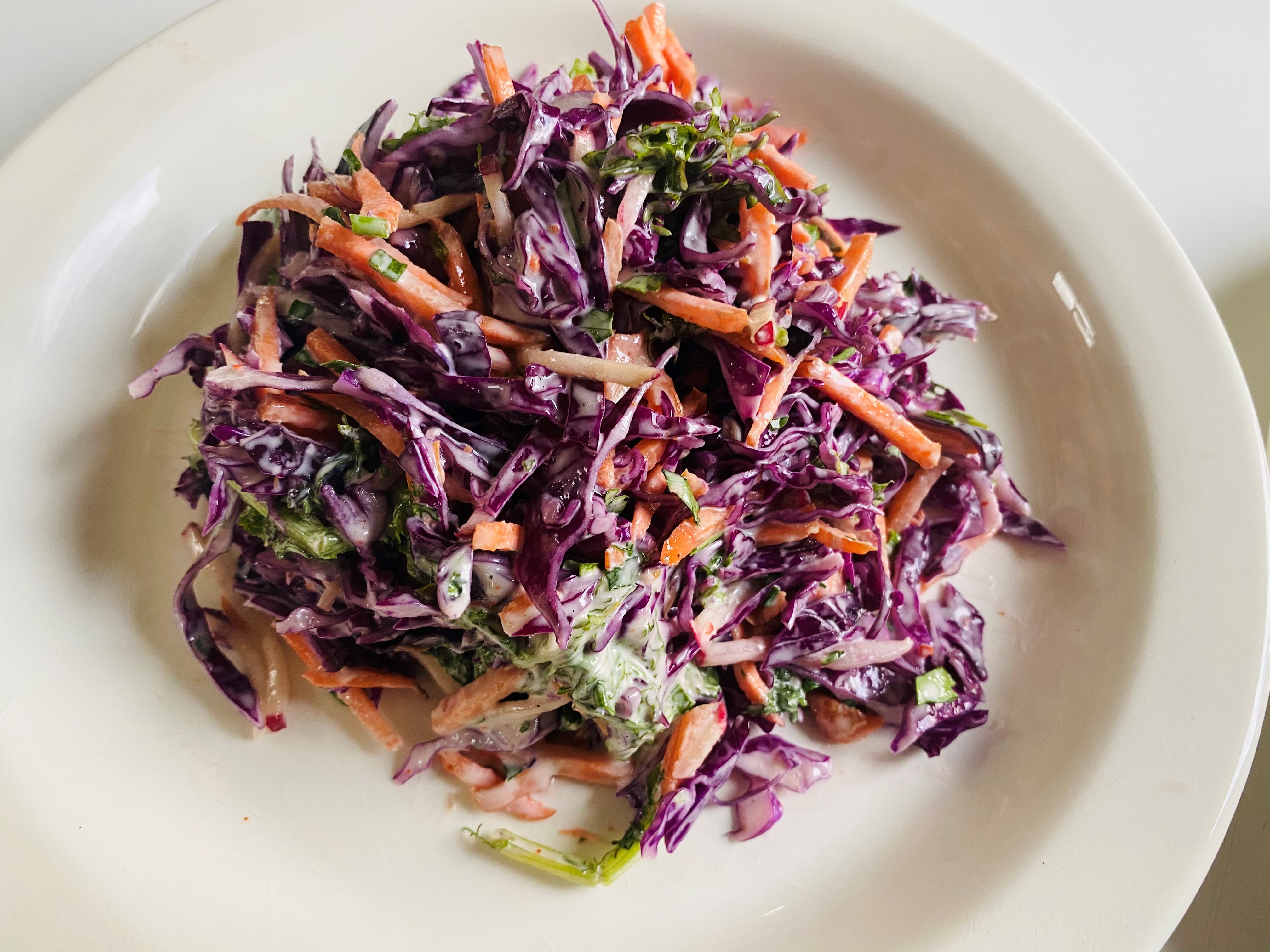 You can get a side of Brussels and cabbage slaw at Chicken Out. Bob Townsend for The Atlanta Journal-Constitution
