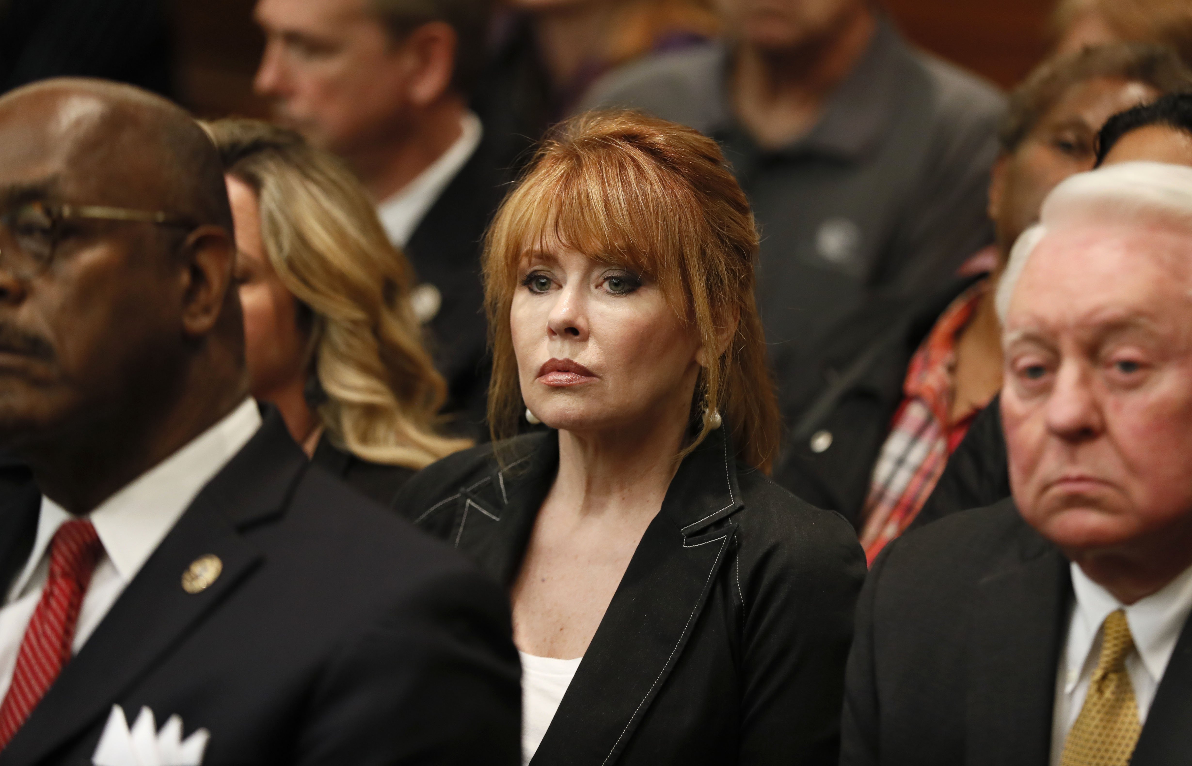 4/23/18 - Atlanta -Dani Jo Carter listens to the verdict. The jury found Tex McIver guilty on four of five charges on their fifth day of deliberations today at the Tex McIver murder trial at the Fulton County Courthouse. Bob Andres bandres@ajc.com