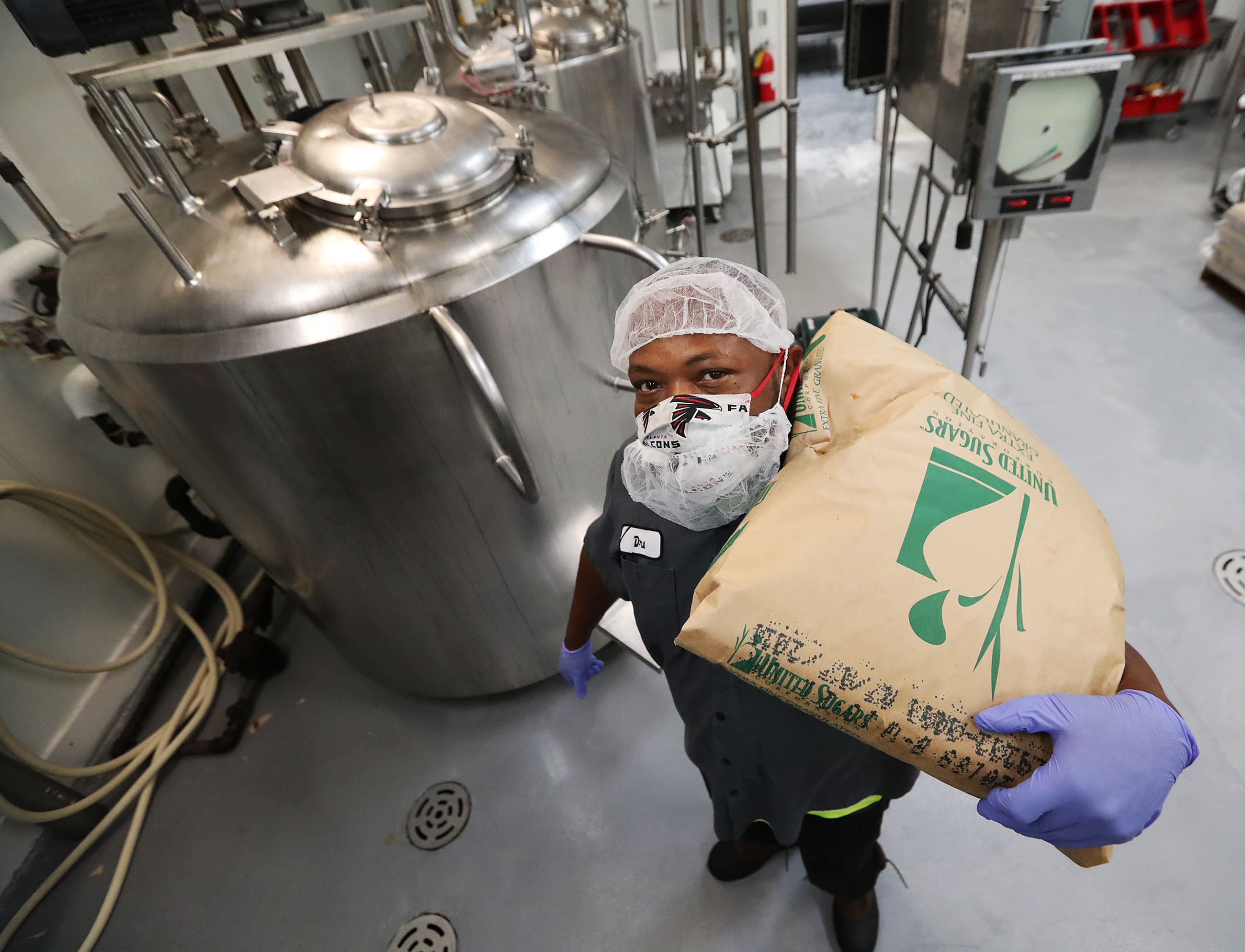 071620 Marietta: Deandre Little “Dre” pauses for a portrait while blending icecream ingredients in the raw room at High Road Craft Brands on Thursday, July 16, 2020 in Marietta. Curtis Compton ccompton@ajc.com