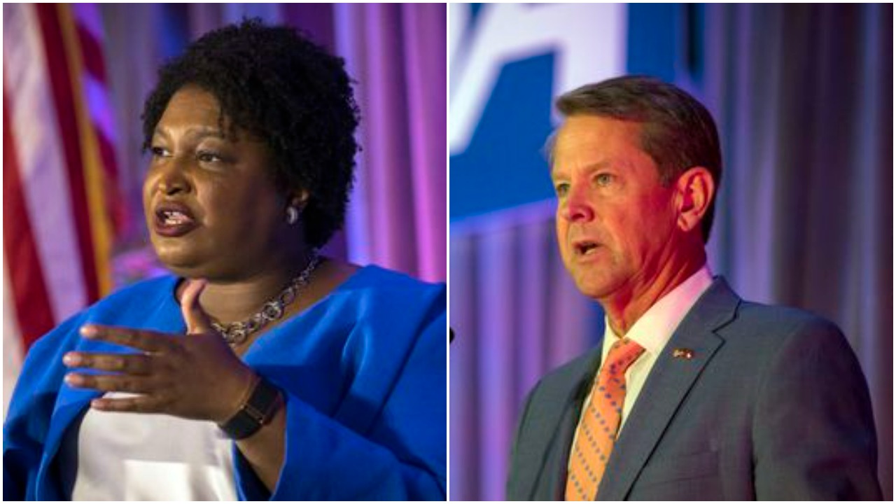 Georgia gubernatorial candidates Stacey Abrams, left, and Governor Brian Kemp, right, speak at the Georgia School Boards Association conference in Savannah.  (AJC Photo/Stephen B. Morton).