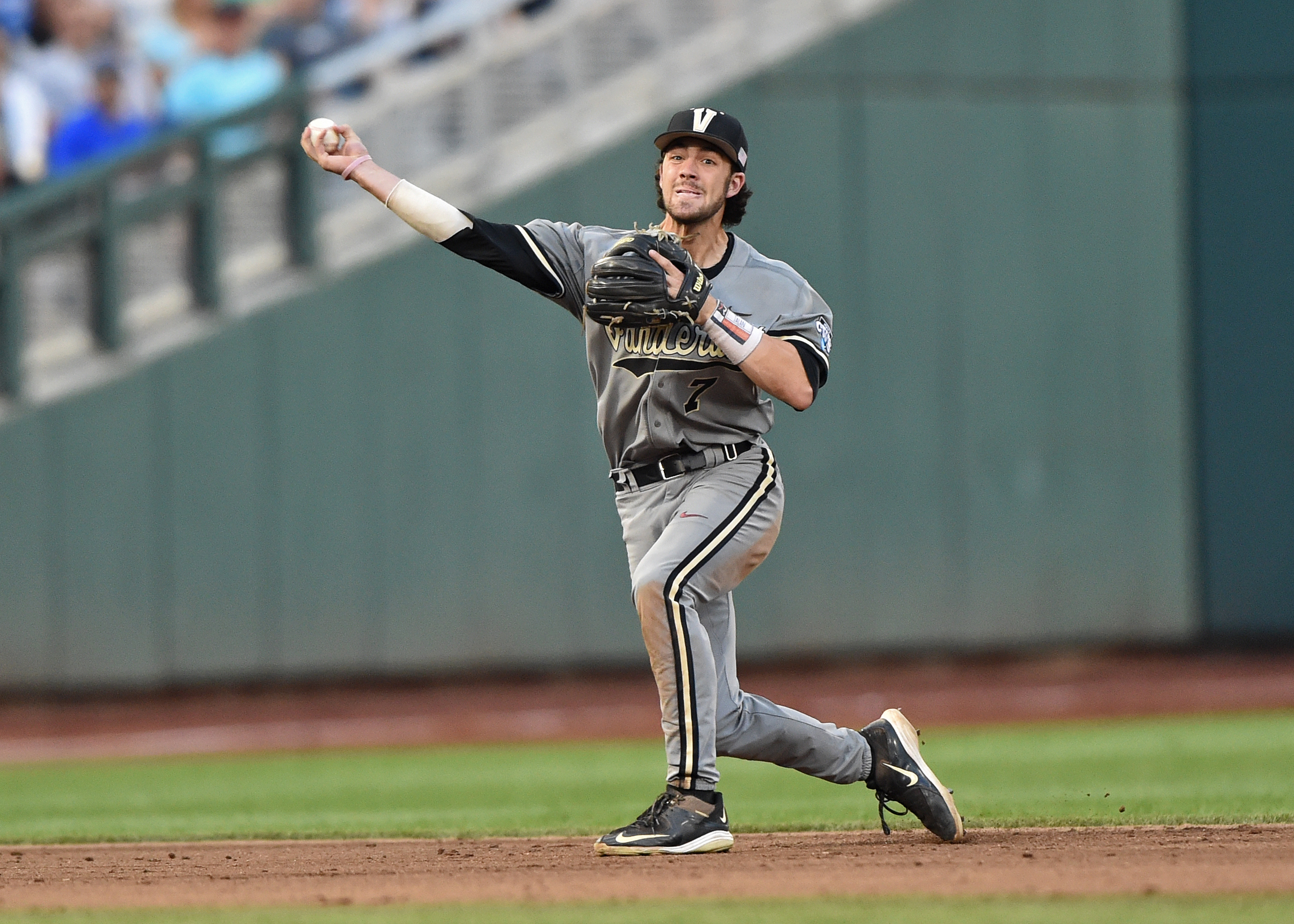 Shortstop Dansby Swanson of the Vanderbilt Commodores looks on