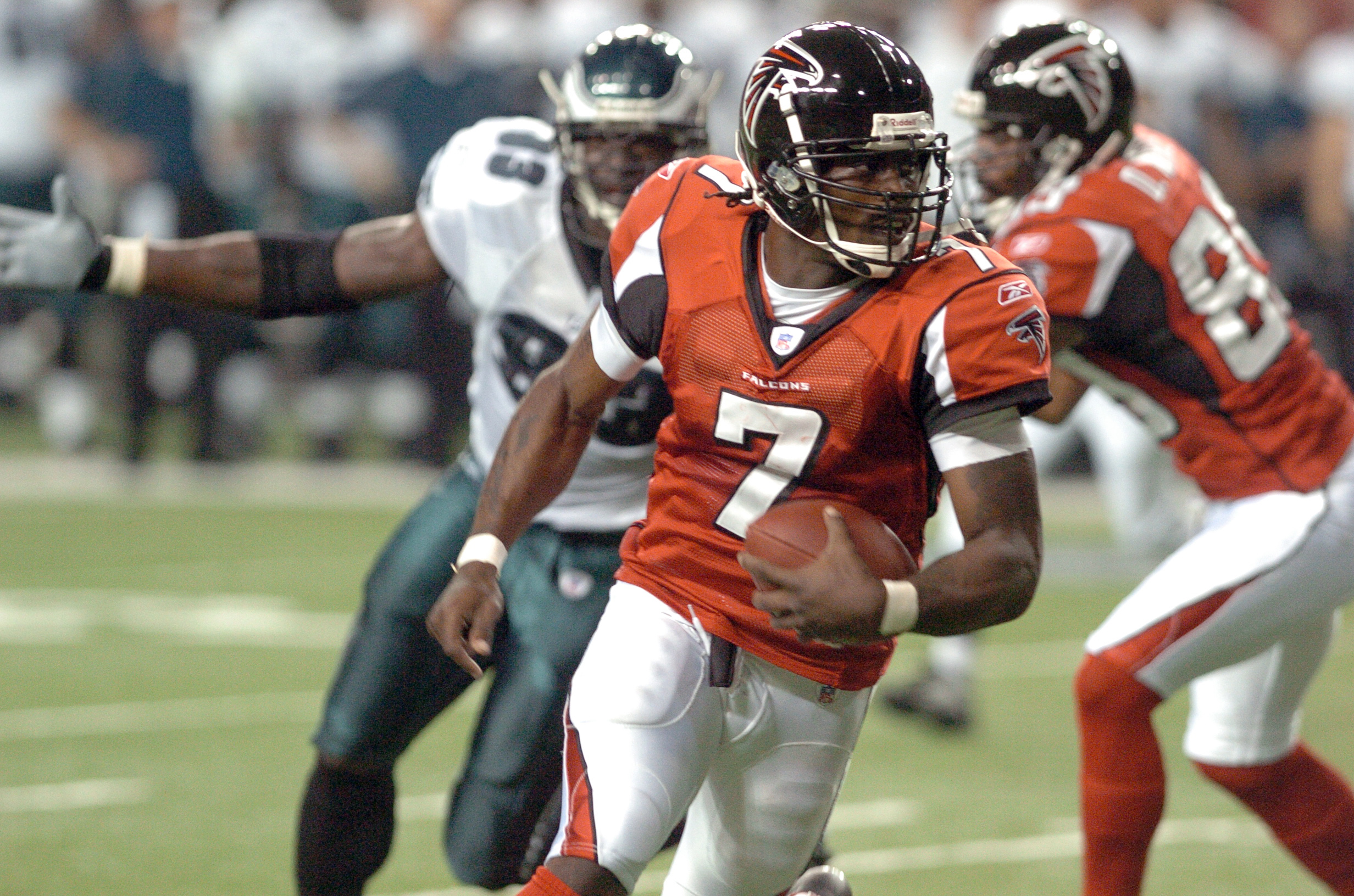 Quarterback Michael Vick of the Atlanta Falcons drops back to pass