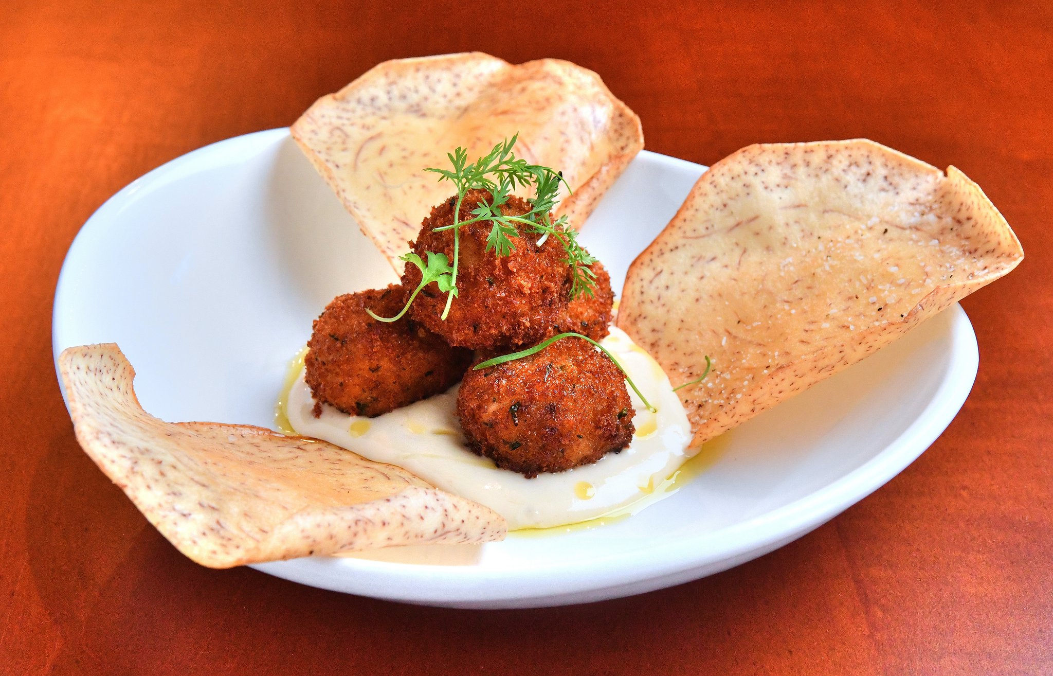 Crab Beignets with lemon aioli. (Contributed by Chris Hunt Photography)