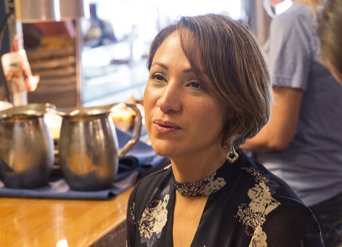Cynthia Roman is the managing director of family services at the Latin American Association (LAA). “Legally speaking, we are American citizens,” she says, “but culturally we are Latinos. So there is a separation there.” (Chad Rhym/Chad.Rhym@ajc.com)