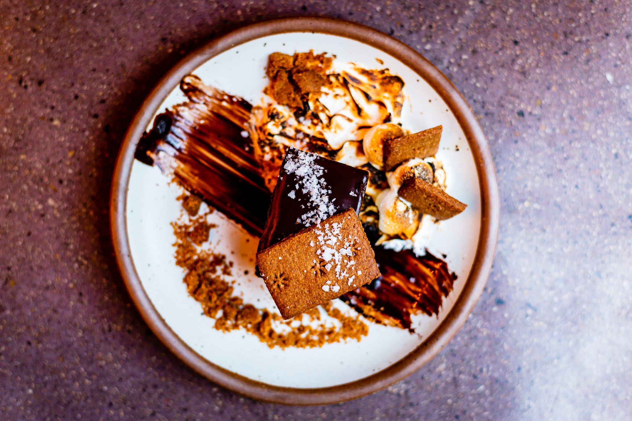 Double Chocolate S'Mores with dark chocolate mousse, caramelized white chocolate mousse, orange-infused honey marshmallow, house beer fudge and house graham crackers. CONTRIBUTED BY HENRI HOLLIS