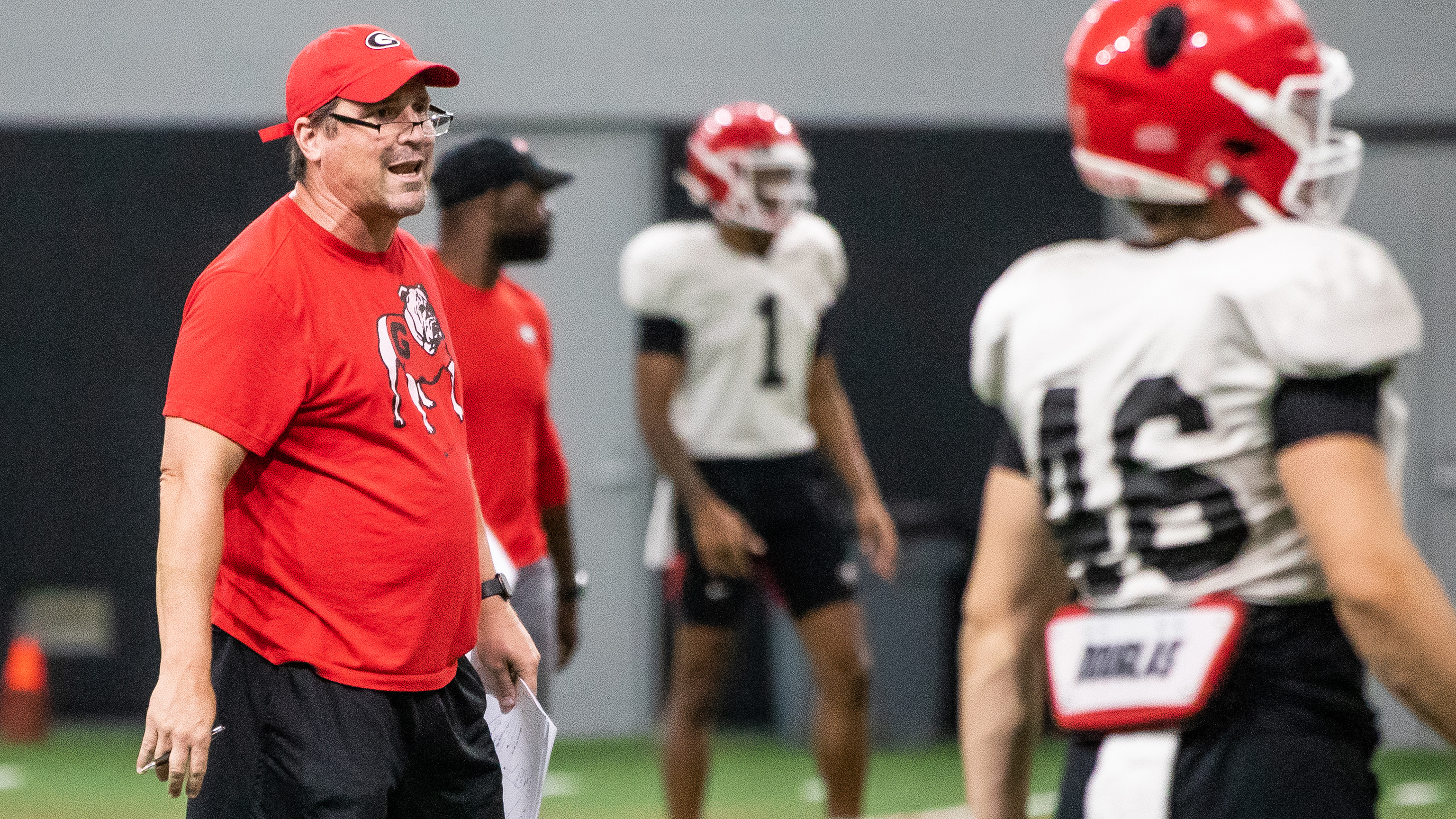 Georgia senior defensive analyst Will Muschamp assists during the Bulldogs’ practice session Monday, Aug. 9, 2021, in Athens. (Tony Walsh/UGA)
