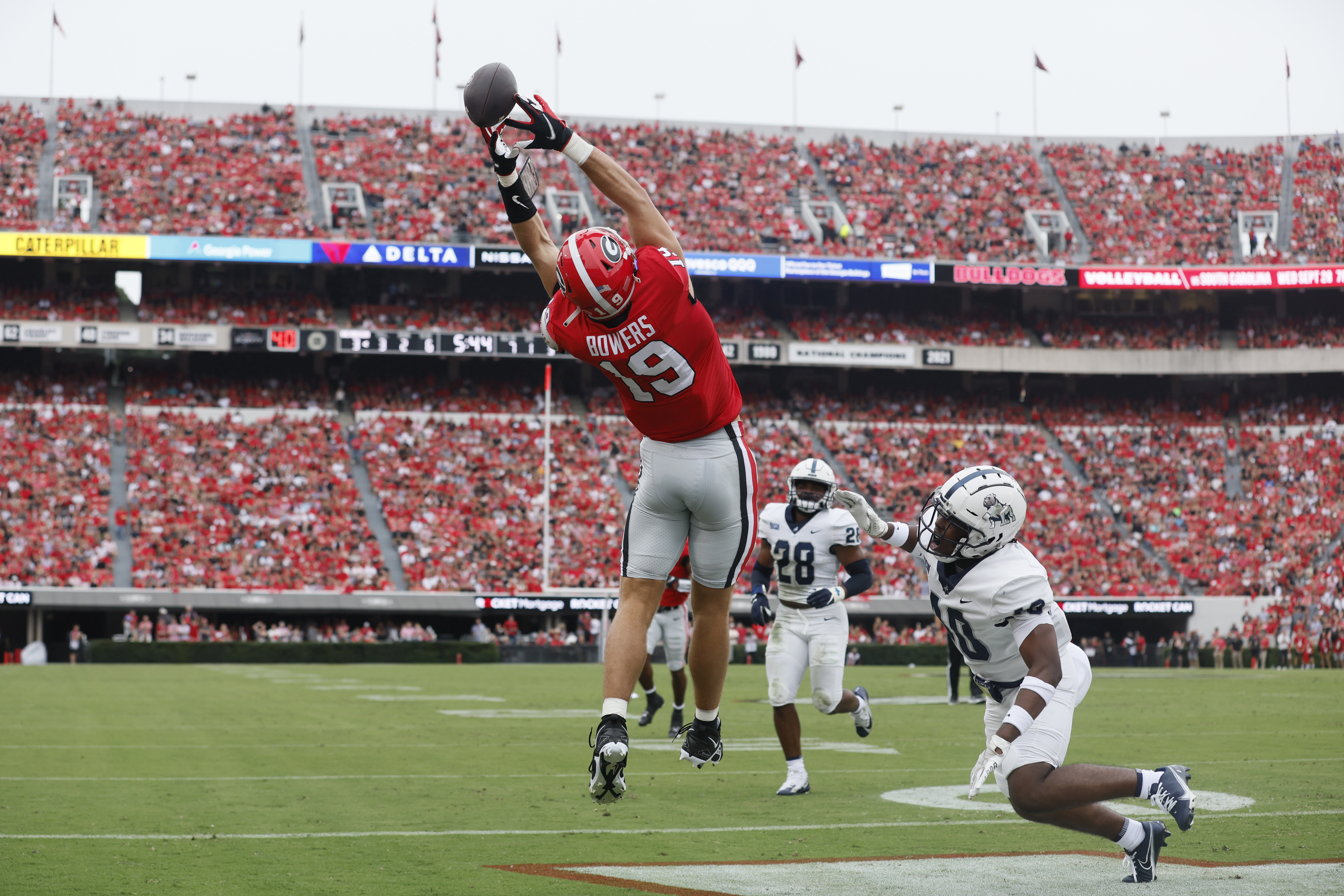 Brock Bowers Georgia Bulldogs Football White Uniform Student