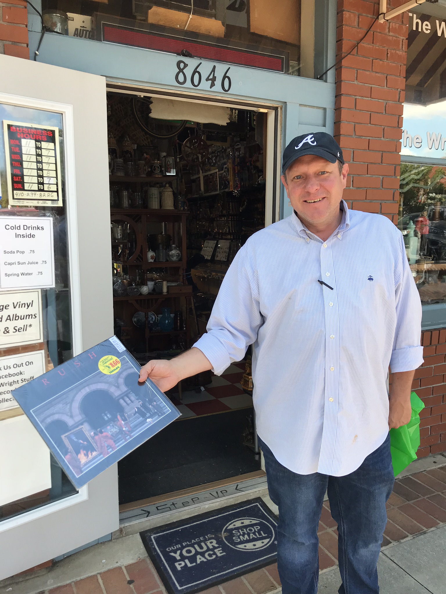 Zach Kell holding his prize: a 1981 master pressing of Rush's "Moving Pictures," which he purchased for $40 from the Wright Stuff Records & Collectibles in Woodstock on October 4, 2018. CREDIT: Rodney Ho/rho@ajc.com