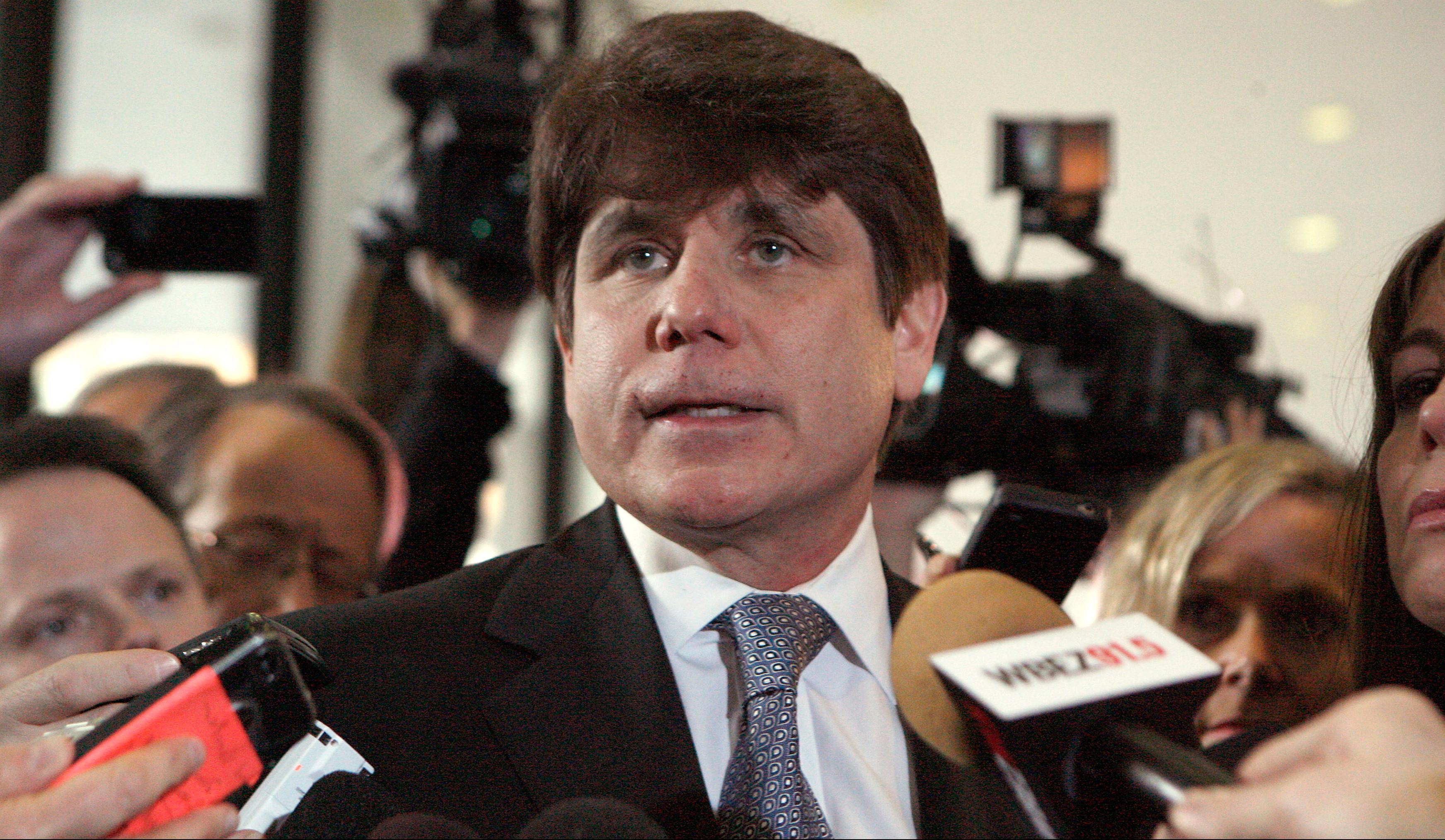 FILE PHOTO: Former Illinois Governor Rod Blagojevich pauses while speaking to the media at the Dirksen Federal Building December 7, 2011 in Chicago, Illinois. Blagojevich was sentenced to 14 years in prison after he was found guilty of 17 public corruption charges. (Photo by Frank Polich/Getty Images)