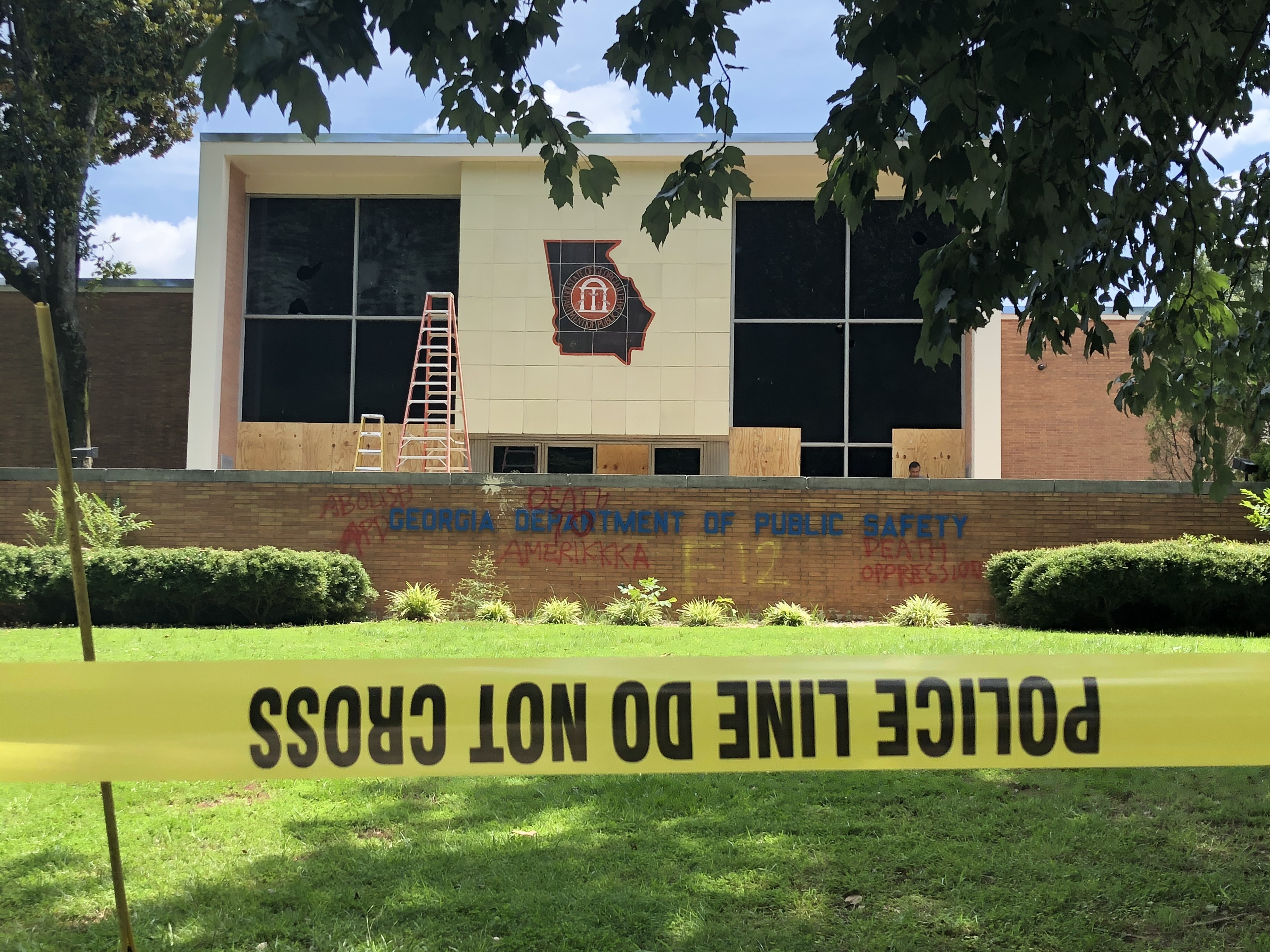 The Georgia Department of Public Safety headquarters on United Avenue suffered broken windows and was tagged with graffiti following a protest that turned violent late Saturday, July 4, 2020. (Photo: J. Scott Trubey/AJC)