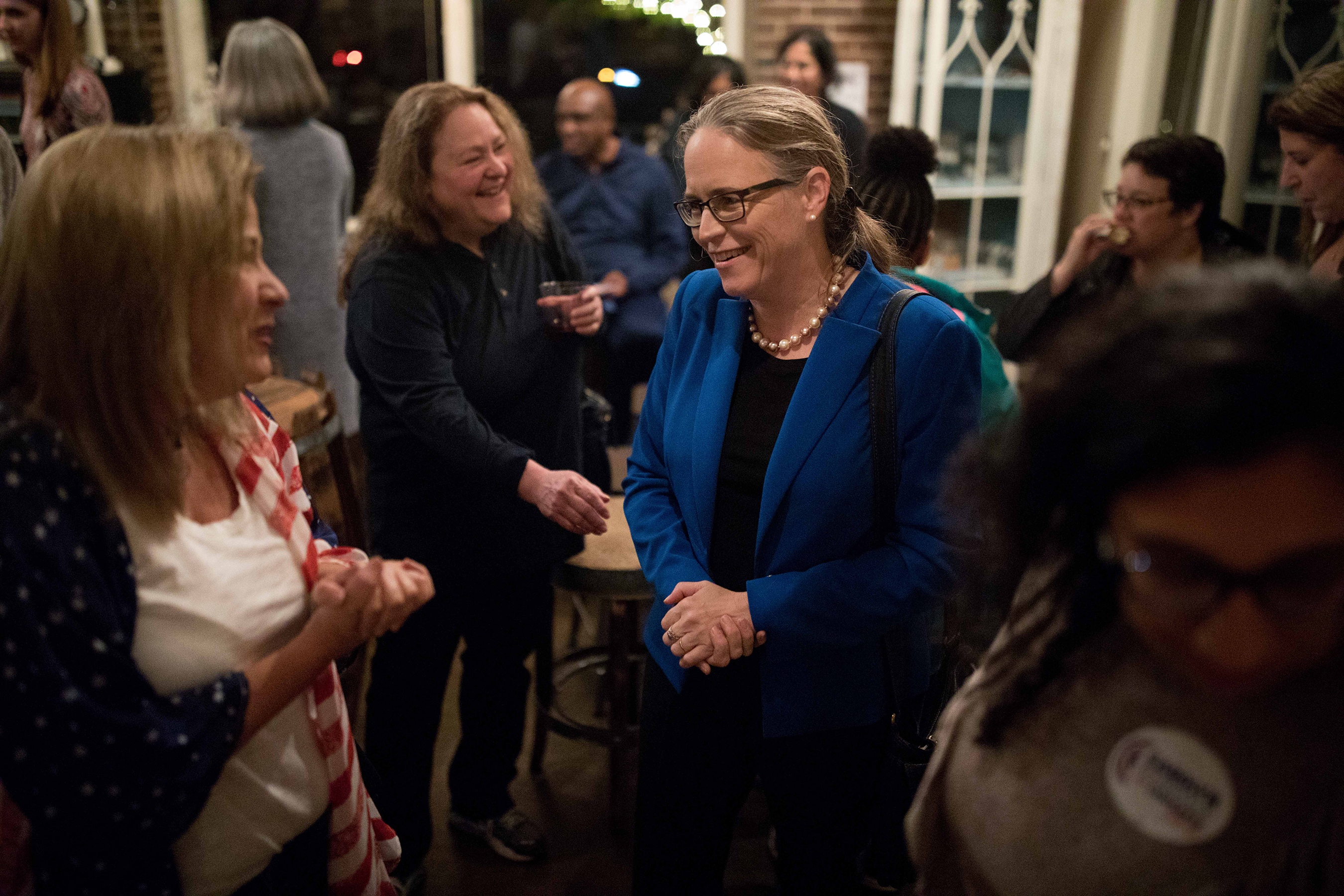 7th Congressional District Candidate Carolyn Bourdeaux speaks to a supporter during an election night party in Norcross on Nov. 6, 2018. Branden Camp/Special