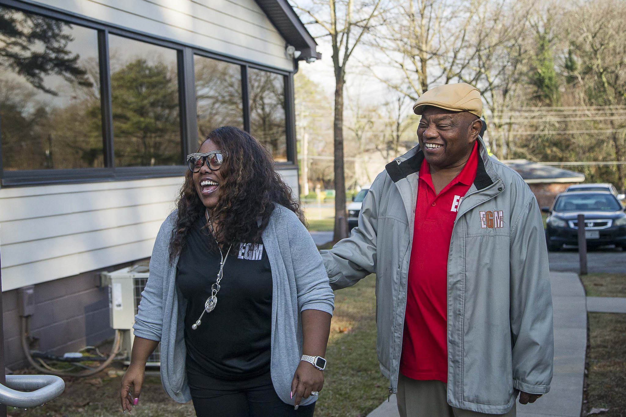EGM Services Inc. CEO Kelsi Queen-Robinson (left) and her father, Arthur Queen, chairman of the board of EGM Services Inc., share a laugh at their office in Decatur Jan. 24, 2020. Queen-Robinson left her job as an educator and got an MBA to help run her father’s business. ALYSSA POINTER/ALYSSA.POINTER@AJC.COM