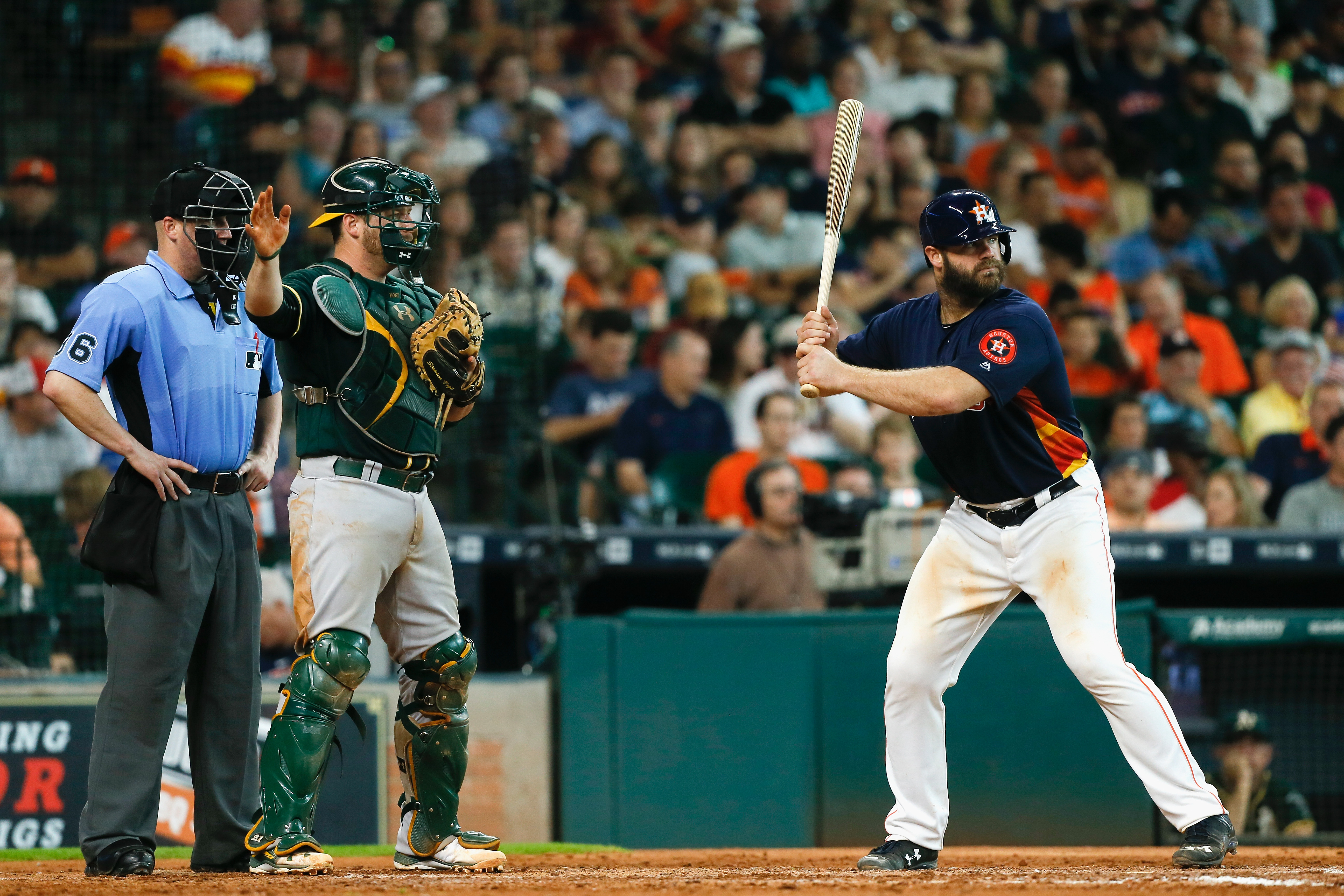 Atlanta Braves catcher Evan Gattis warms up during - NARA & DVIDS