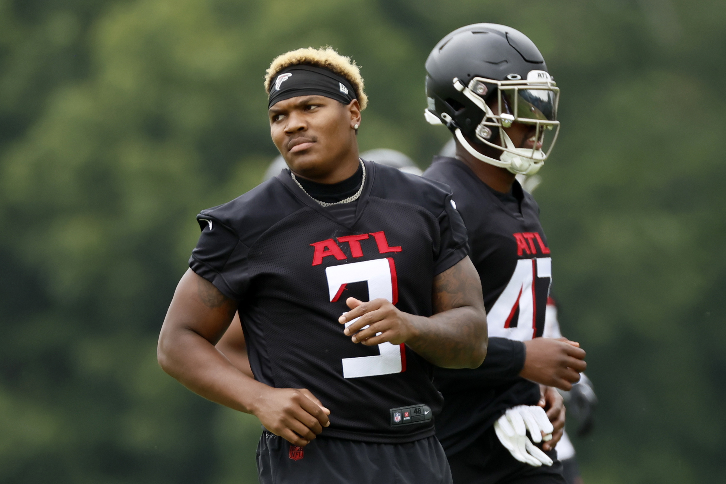 Atlanta Falcons linebacker Mykal Walker (3) and cornerback A.J.