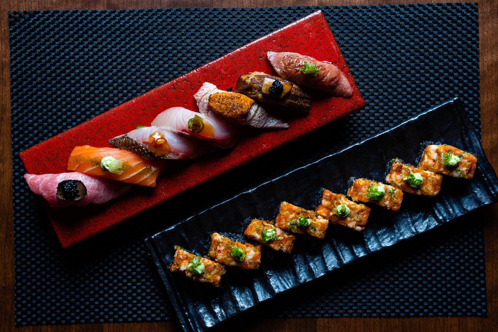 A selection of nigiri (top) and the Roku roll at District M in Sandy Springs. CONTRIBUTED BY HENRI HOLLIS