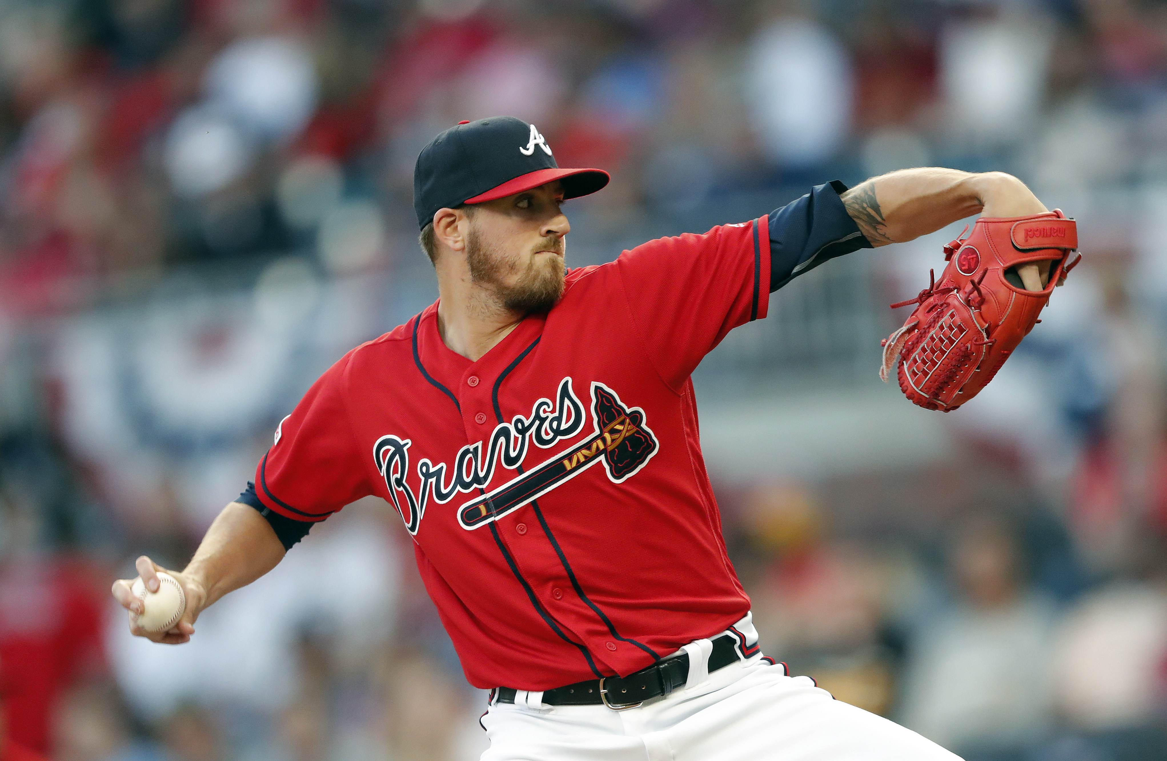 Photos: Braves break out red uniforms, beat Marlins