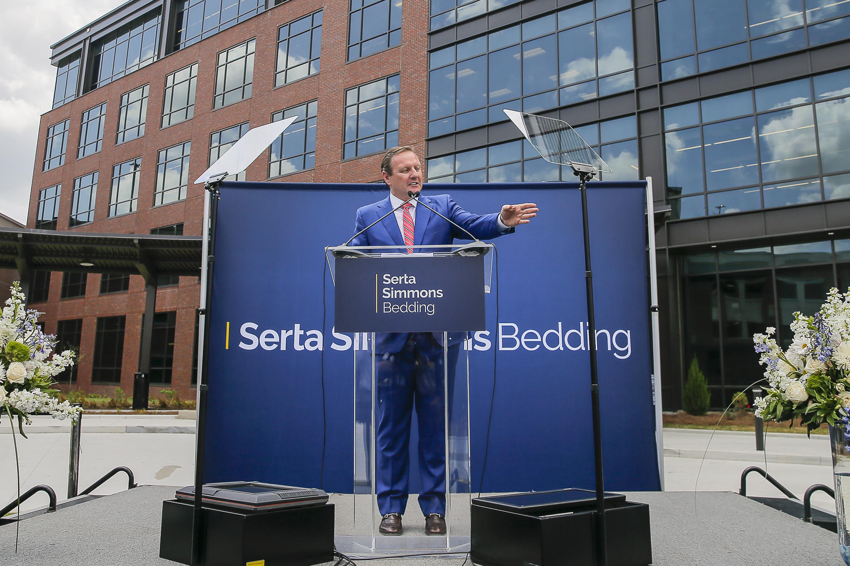 Outgoing Serta Simmons Bedding CEO Michael Traub speaks during a grand opening celebration for Serta Simmons Bedding's new national headquarters at Assembly in Doraville. (ALYSSA POINTER/ALYSSA.POINTER@AJC.COM)