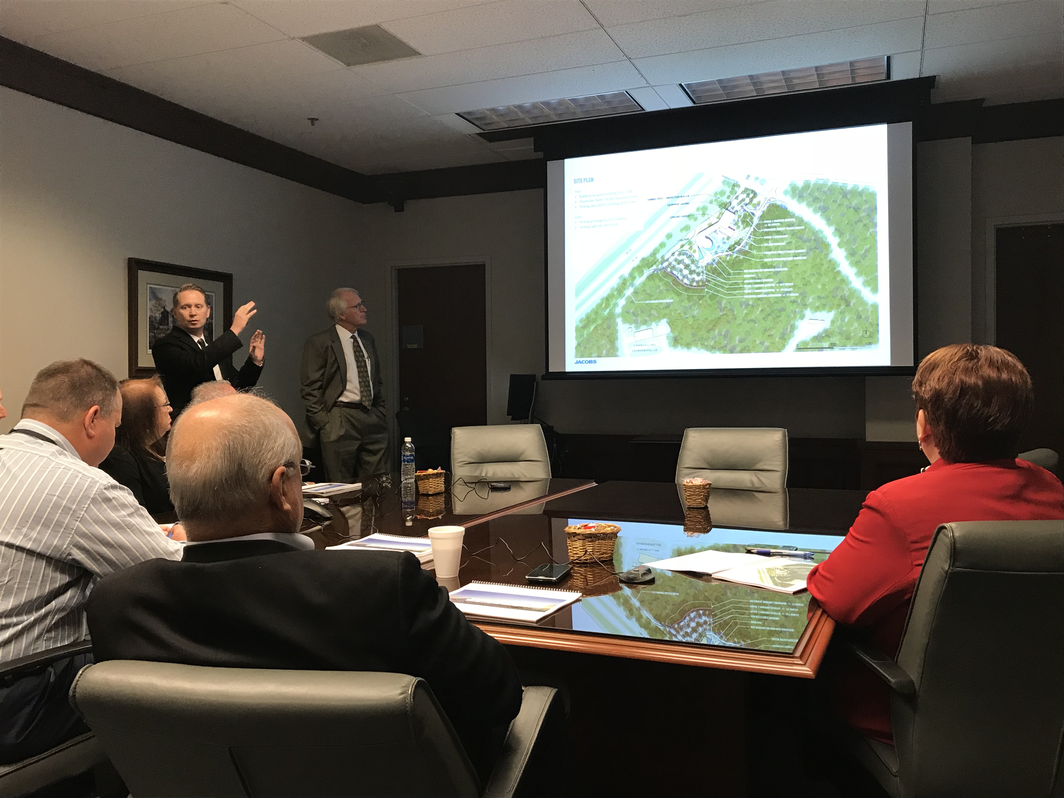 Gwinnett Commission Chairman Charlotte Nash (far right) and other commissioners listen to a Tuesday briefing about the design of the county’s planned $30 million “water innovation center.” TYLER ESTEP / TYLER.ESTEP@AJC.COM