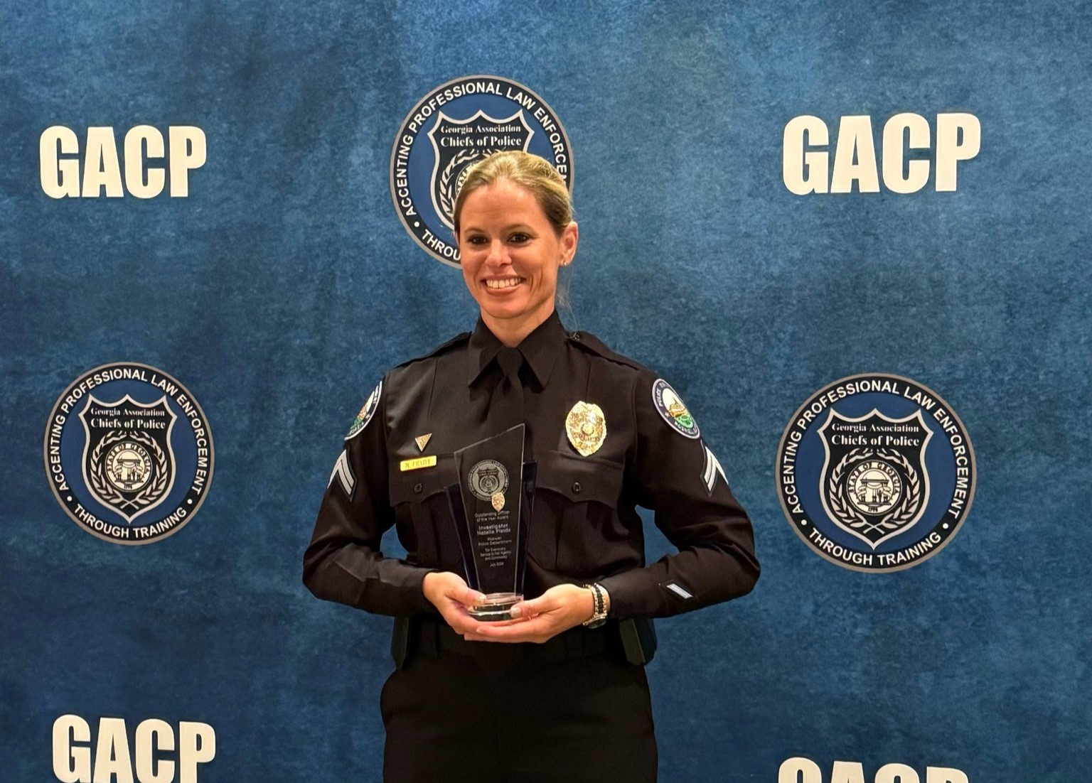ajc.com - Henri Hollis - Roswell detective wins statewide Officer of the Year award