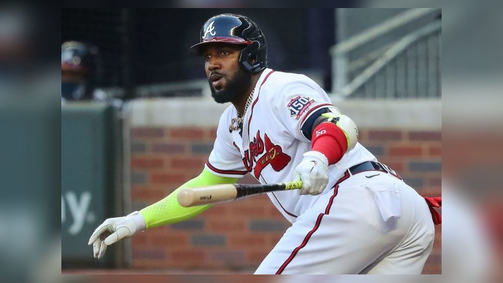 Marcell Ozuna injured sliding into third base