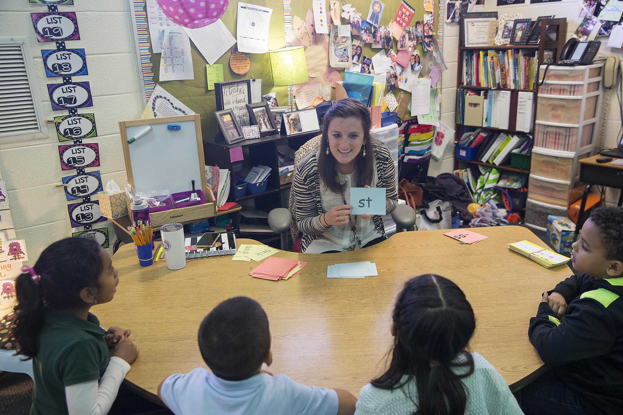First grade teacher Jessica Strickland (center) teaches a phonics lesson to her students using the Orton Gillingham learning approach at Sawyer Road Elementary school in Marietta, Thursday, February 7, 2019.