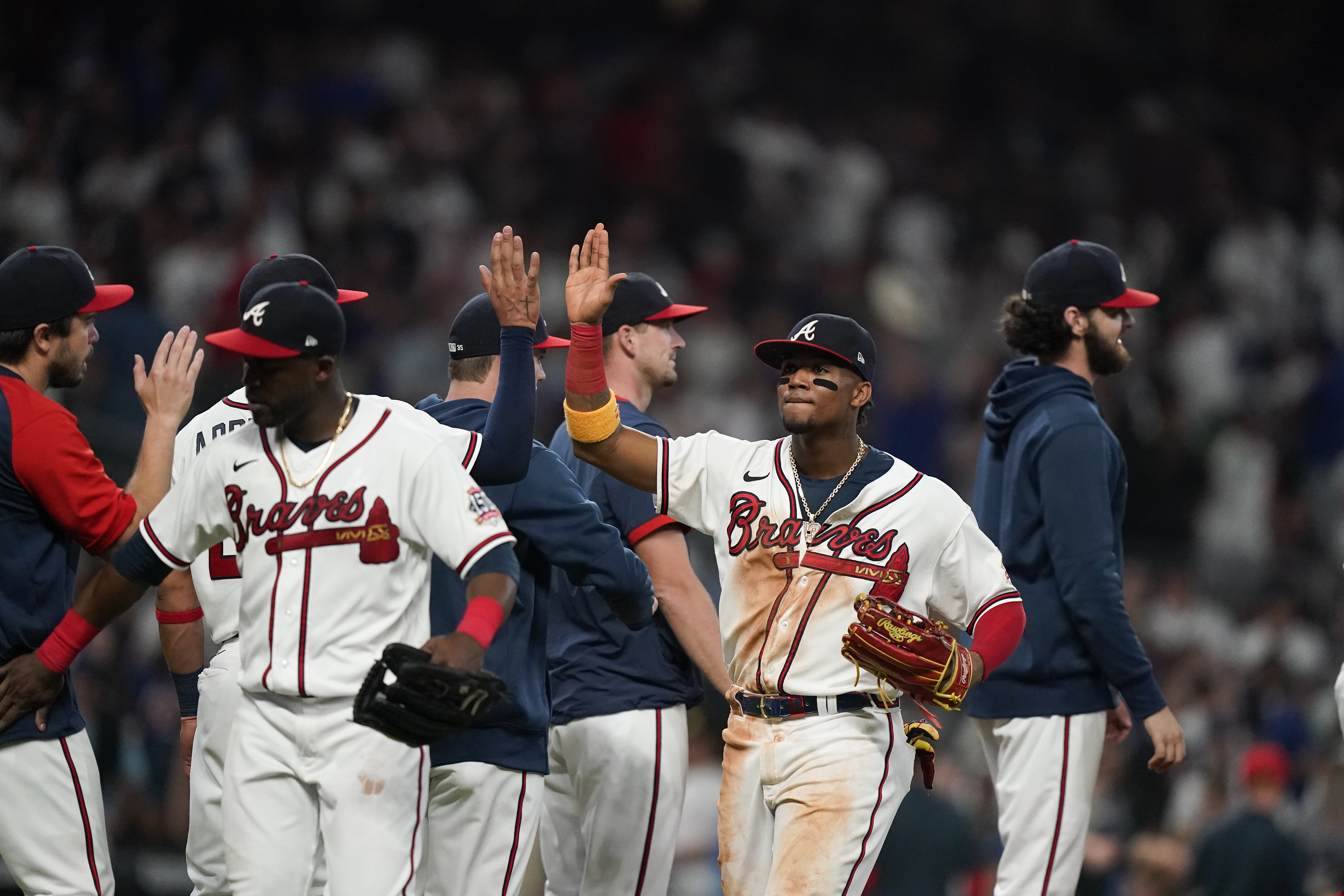 Albies, Almonte power Braves past Dodgers in 6-4 win