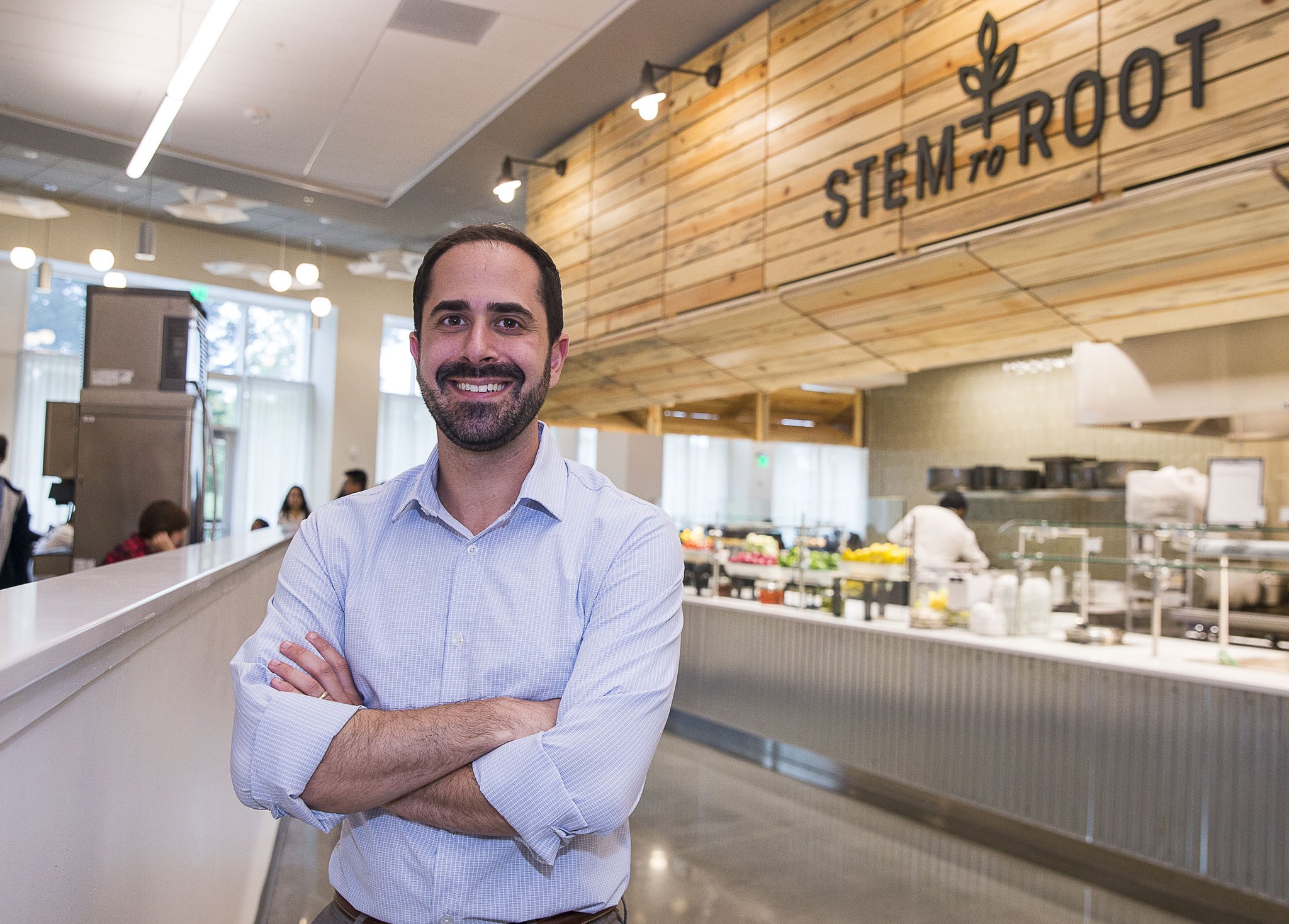 Chad Sunstein, director of campus dining at Emory University, is seen near the Stem to Root food bar at the Dobbs Common Table dining hall.